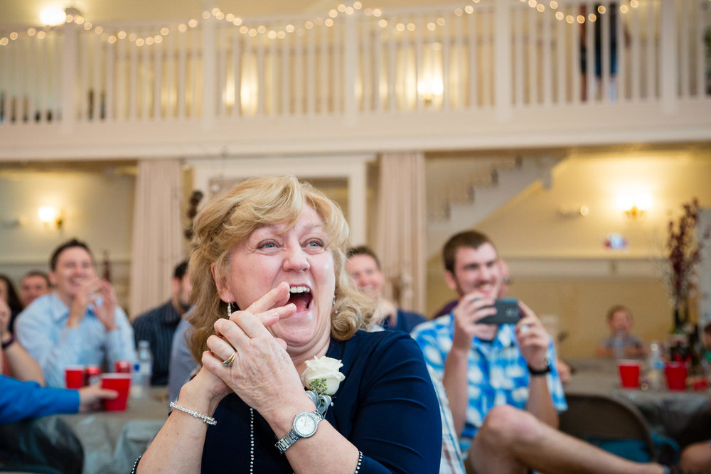 heritage-hall-missoula-montana-brides-mom-laughing-during-toasts.jpg