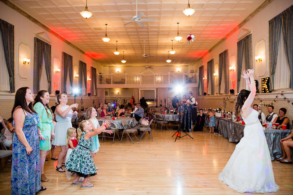 heritage-hall-missoula-montana-bride-tosses-bouquet.jpg