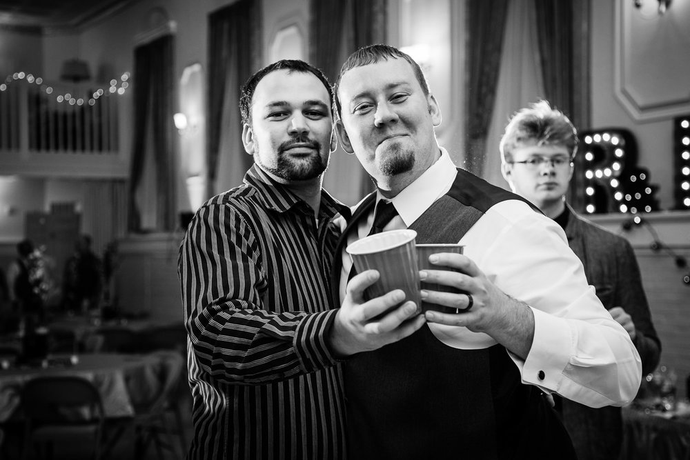 heritage-hall-missoula-montana-groom-friend-share-reception-beers.jpg