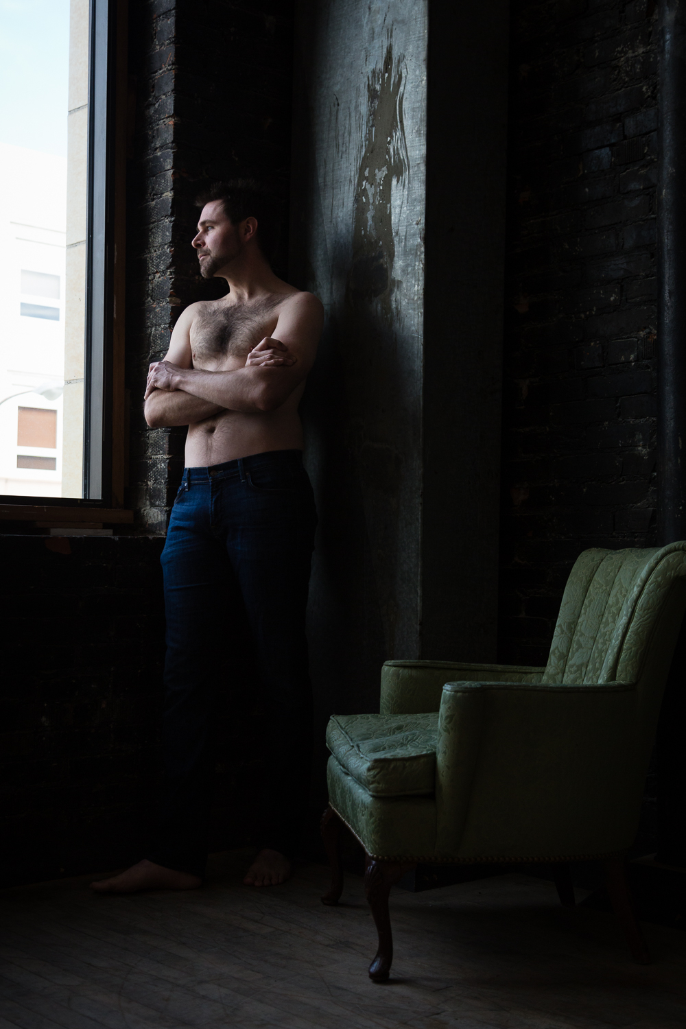 montana-male-boudoir-photoshoot-man-leaning-against-window.jpg