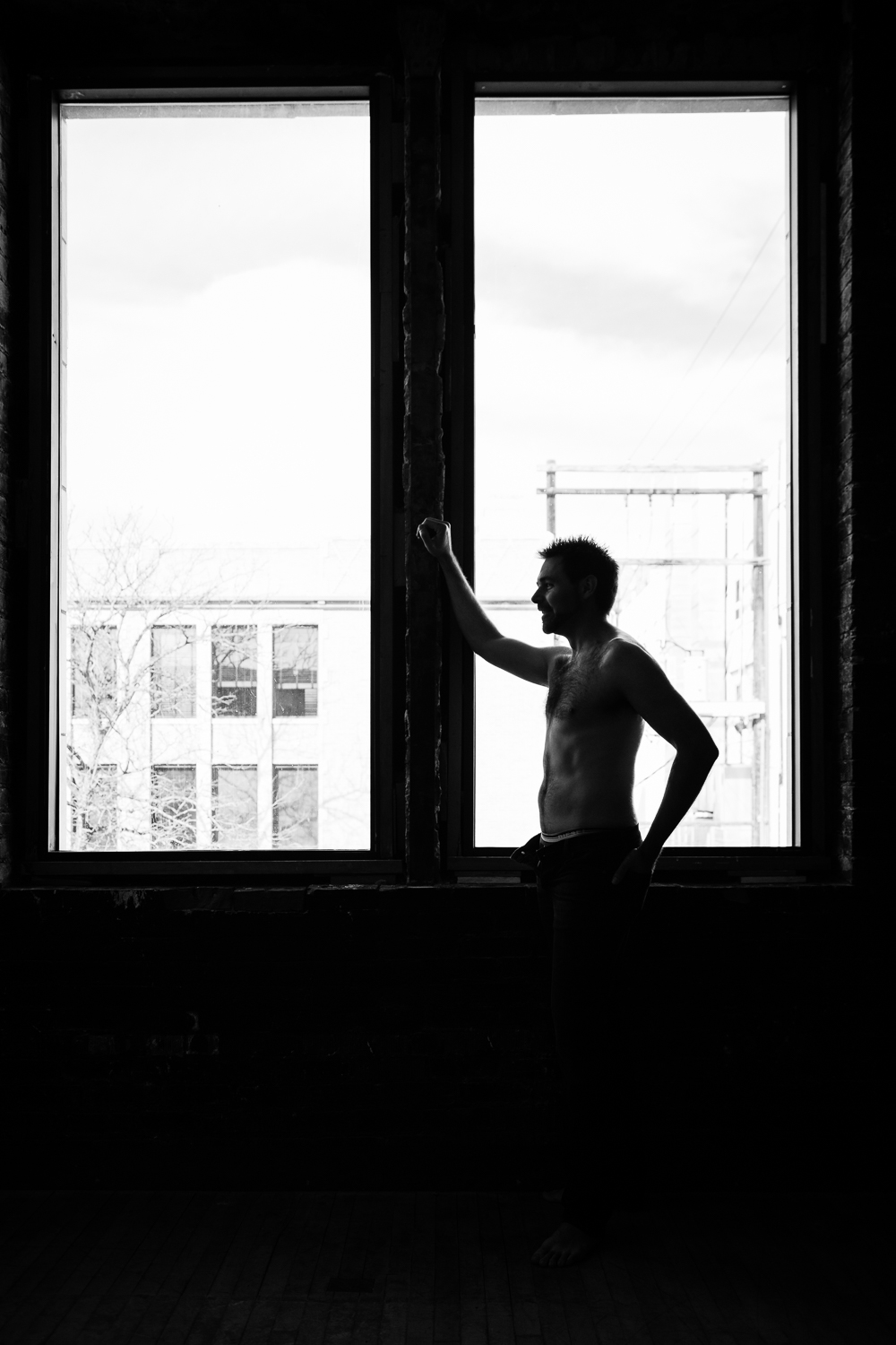 montana-male-boudoir-photoshoot-silhouette-man-against-window.jpg