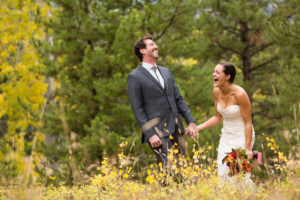 big-sky-montana-gallatin-riverhouse-wedding-first-look-laughter.jpg
