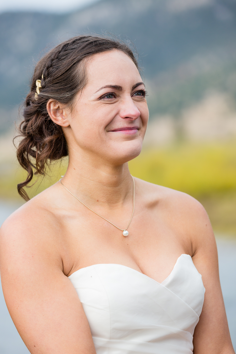 big-sky-montana-gallatin-riverhouse-wedding-bride-smiles-during-ceremony.jpg