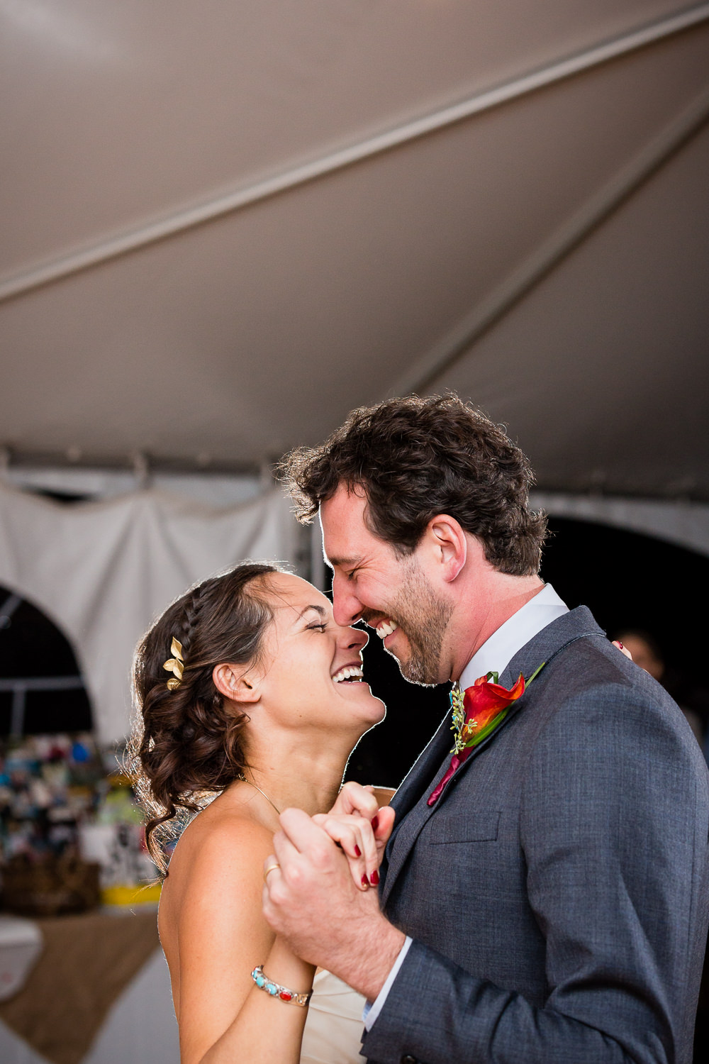 big-sky-montana-gallatin-riverhouse-wedding-bride-groom-laugh-during-first-dance.jpg