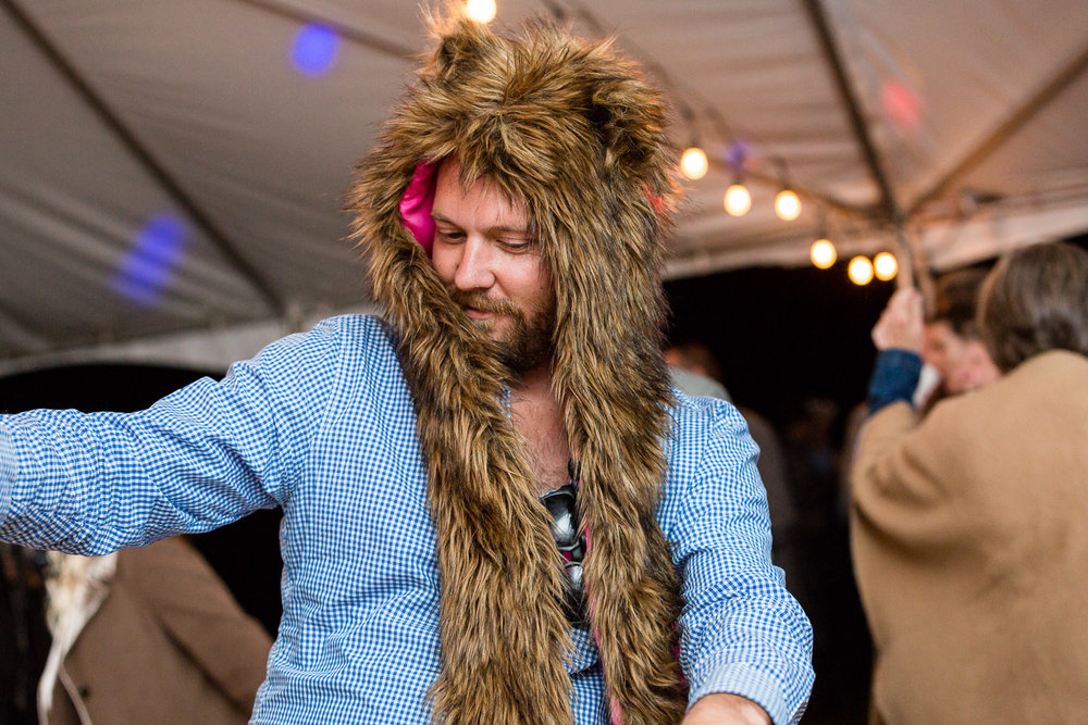 big-sky-montana-gallatin-riverhouse-wedding-guest-dancing-in-animal-hat.jpg