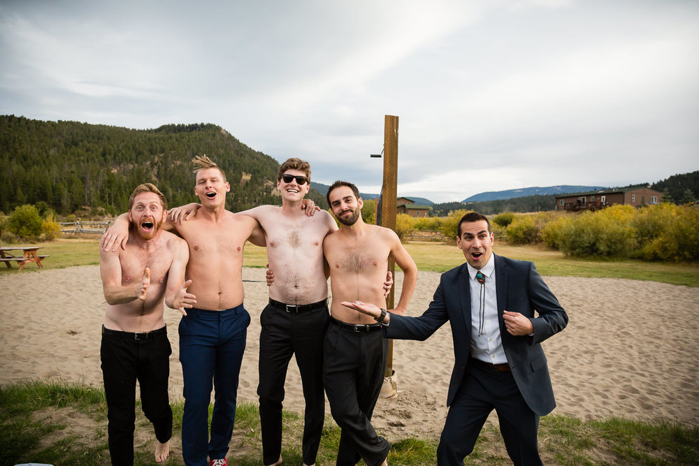 big-sky-montana-gallatin-riverhouse-wedding-men-posing-without-shirts.jpg