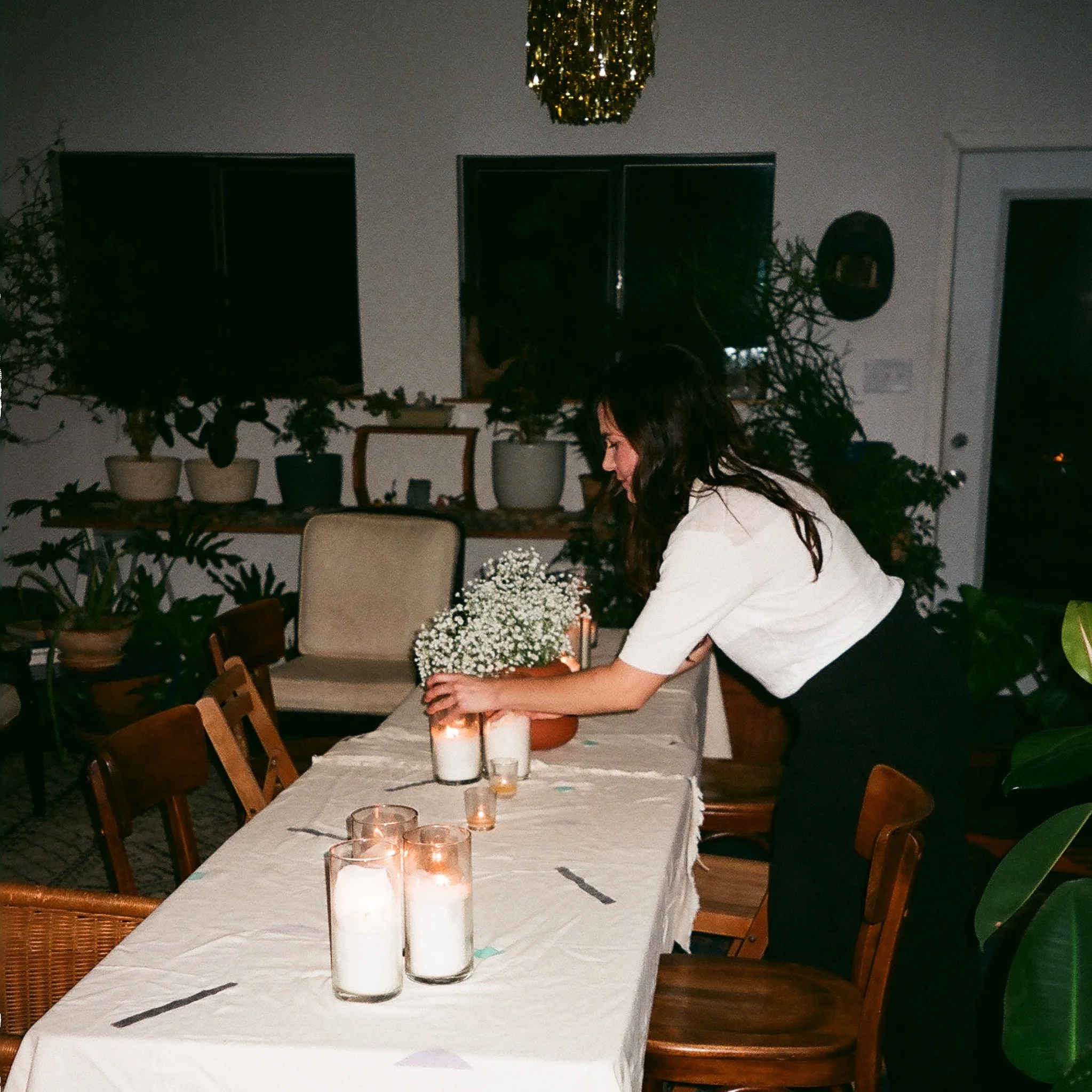 Sarah sets the table
