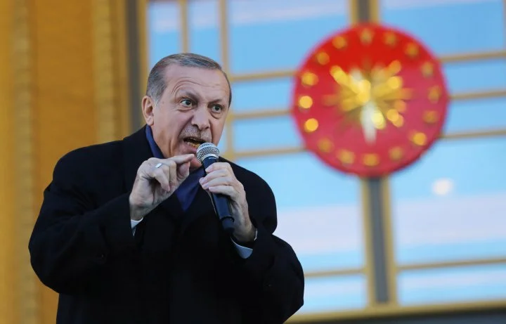 Turkish President Tayyip Erdogan gives a referendum victory speech to his supporters at the Presidential Palace on April 17, 2017 in Ankara Turkey. Elif Sogut—Getty Images