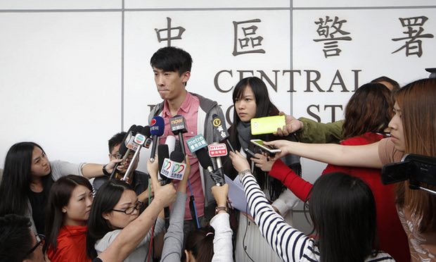 Pro-independence lawmakers Sixtus Leung and Yau Wai-ching speak to the media outside a police station in Hong Kong on Wednesday. Nine other democracy activists have now been arrested. Photograph: Kin Cheung/AP