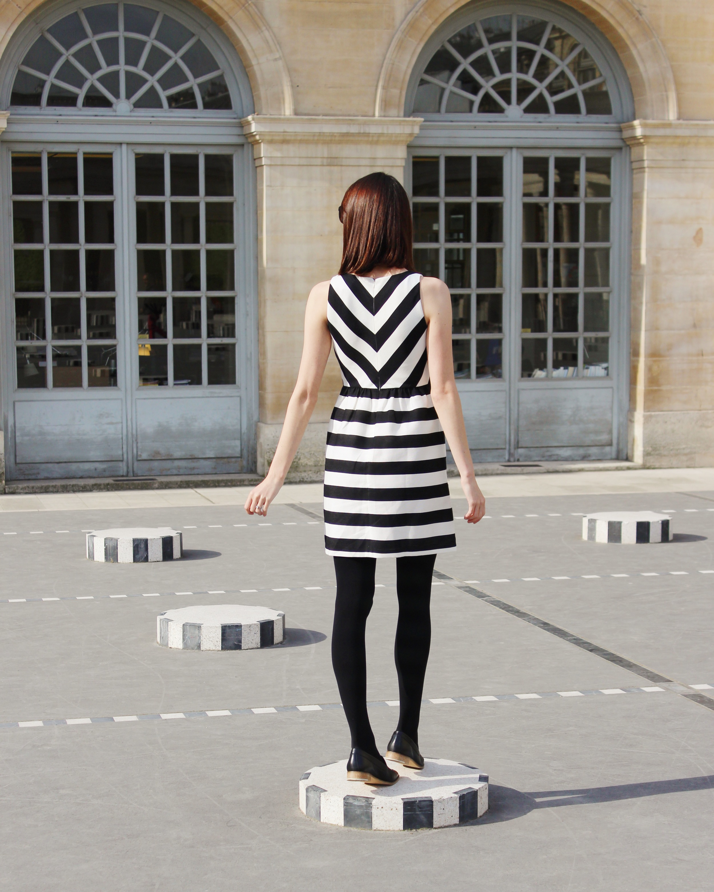Stripes on Stripes - Wearing a Loft dress and Everlane loafers at the Palais Royal in Paris | Sundays and Somedays