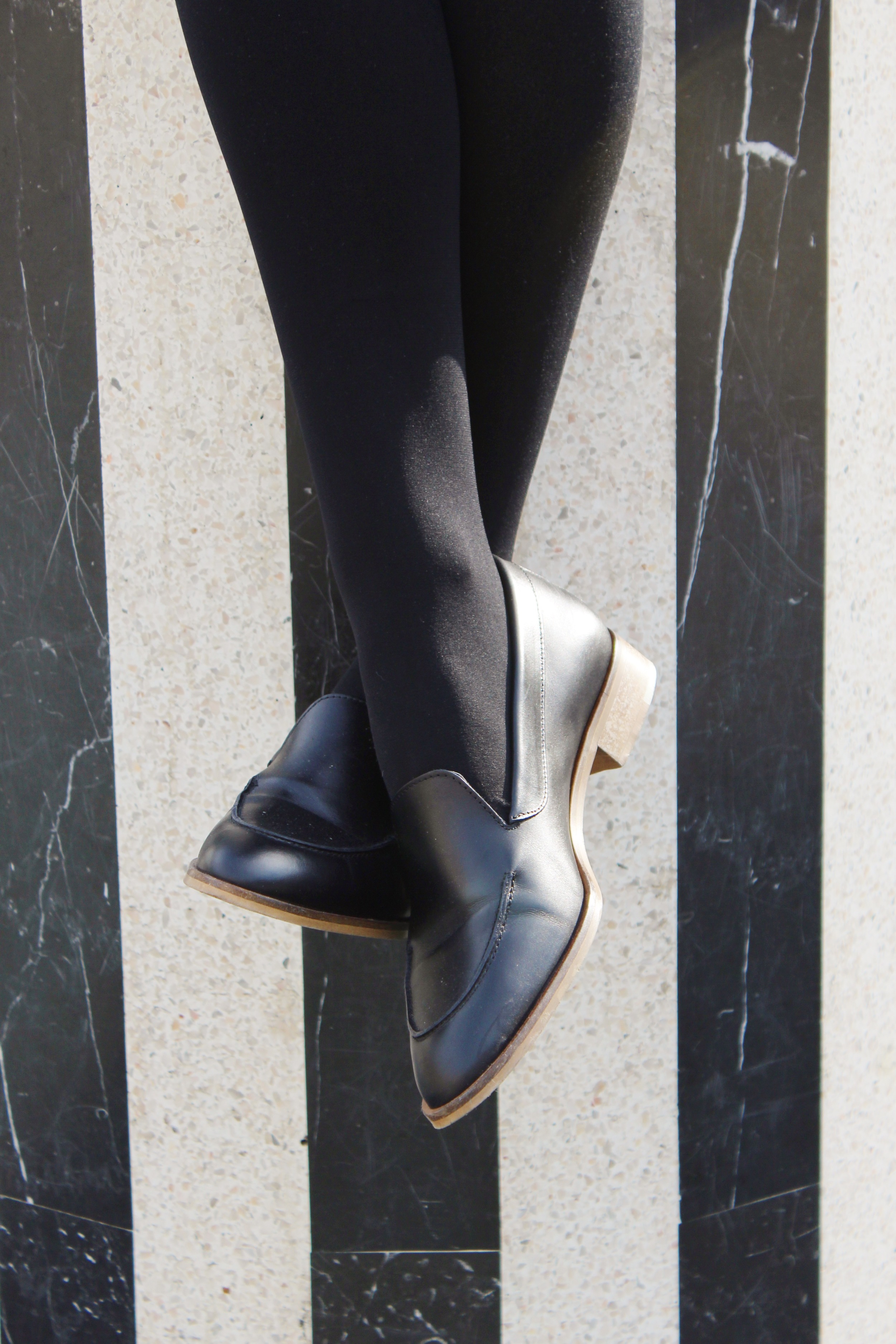 Stripes on Stripes - Wearing a Loft dress and Everlane loafers at the Palais Royal in Paris | Sundays and Somedays