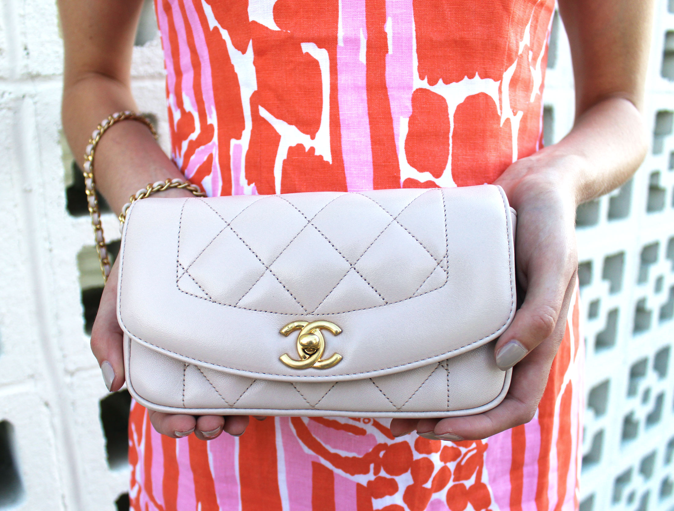 Orange you glad? Wearing the loveliest Lilly for Target giraffe print shift dress and a matching blush Chanel bag.