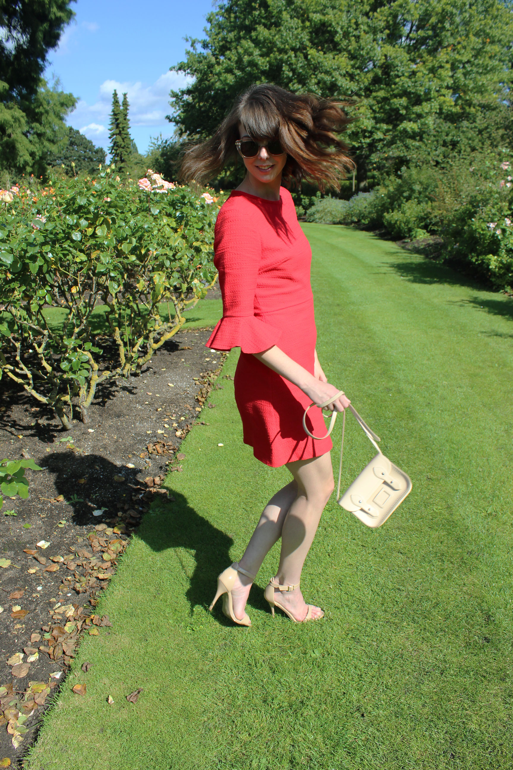 Taking a red Topshop dress and a Cambridge Satchel Company bag for a spin in Regent's Park.