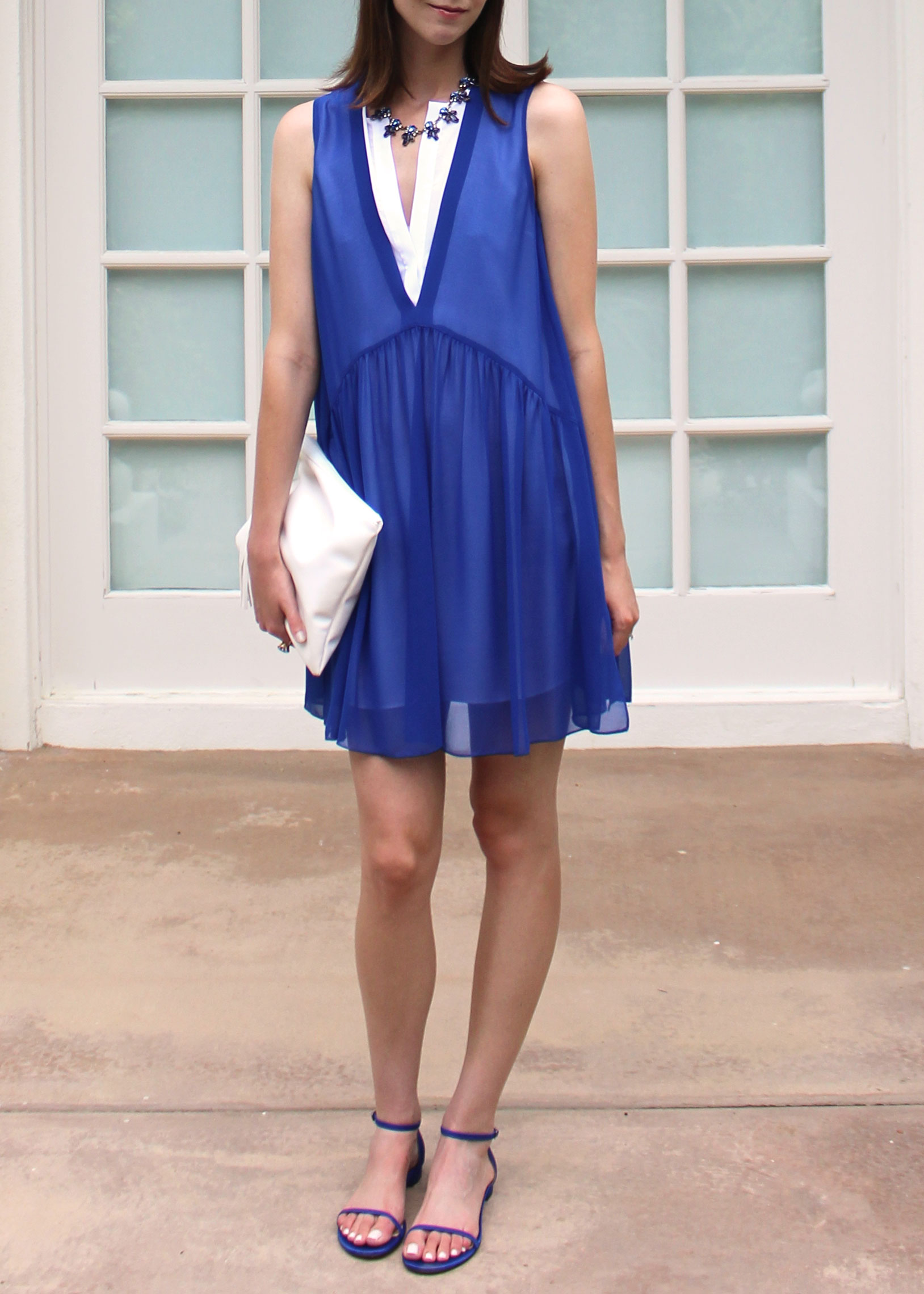 Blue and white Sandro dress with M.Gemi flats.