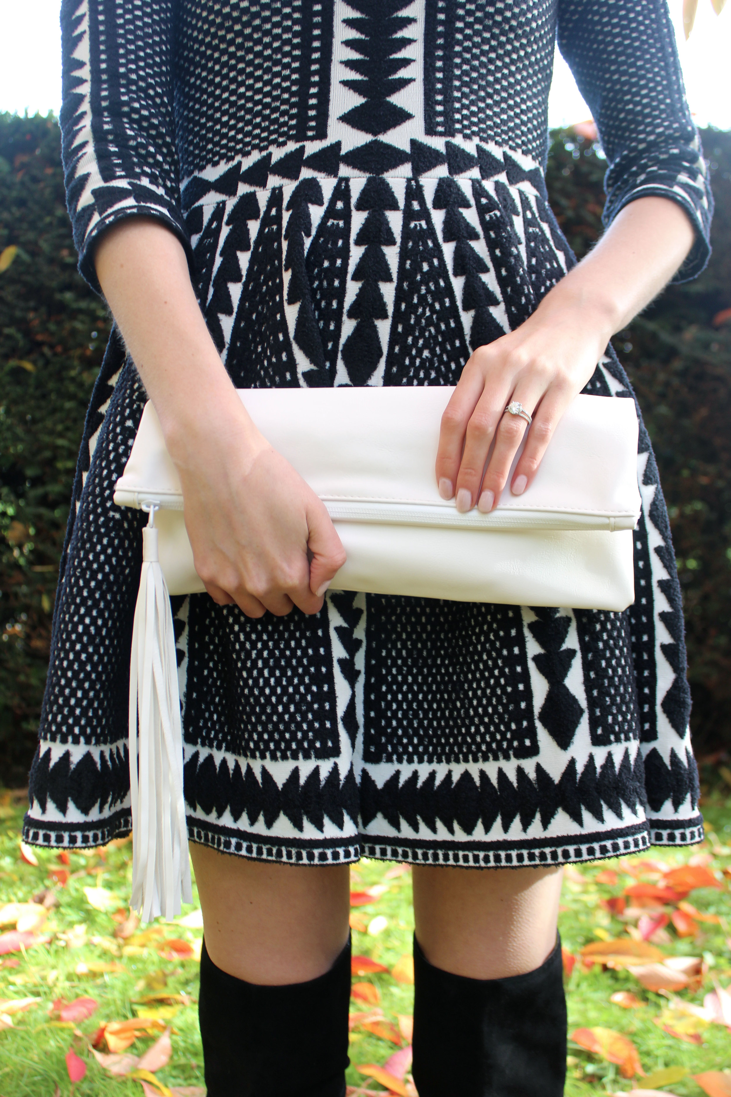 Perfect fall outfit - over the knee boots and a cozy long sleeved sweater dress.