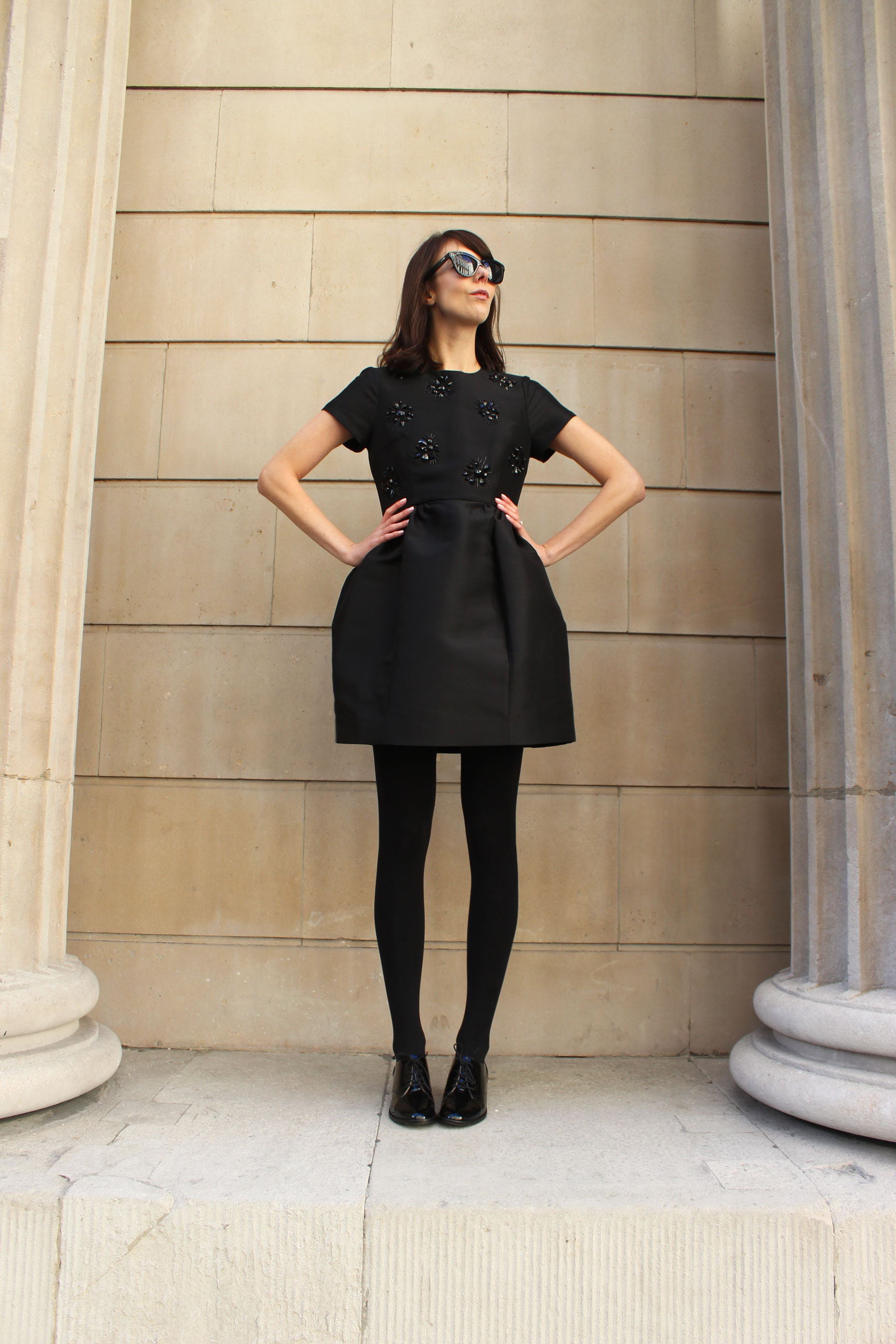 Pairing a LBD with opaque tights and patent flats.