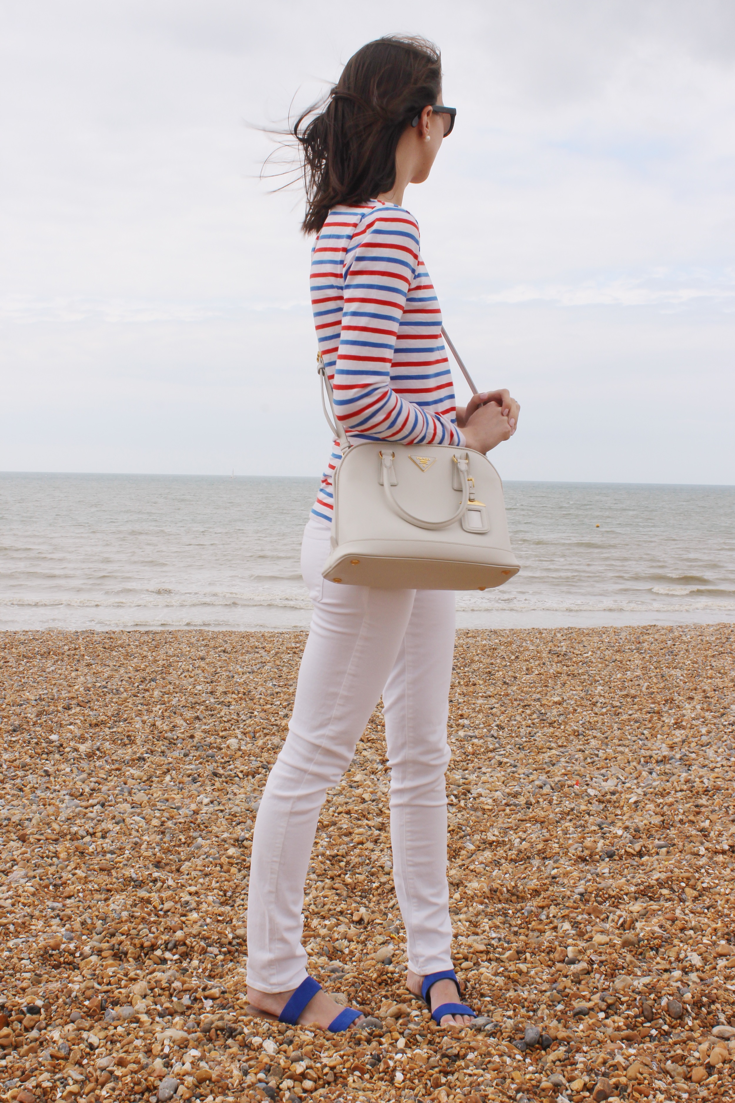 Admiring the views at Brighton Beach wearing red, white and blue.