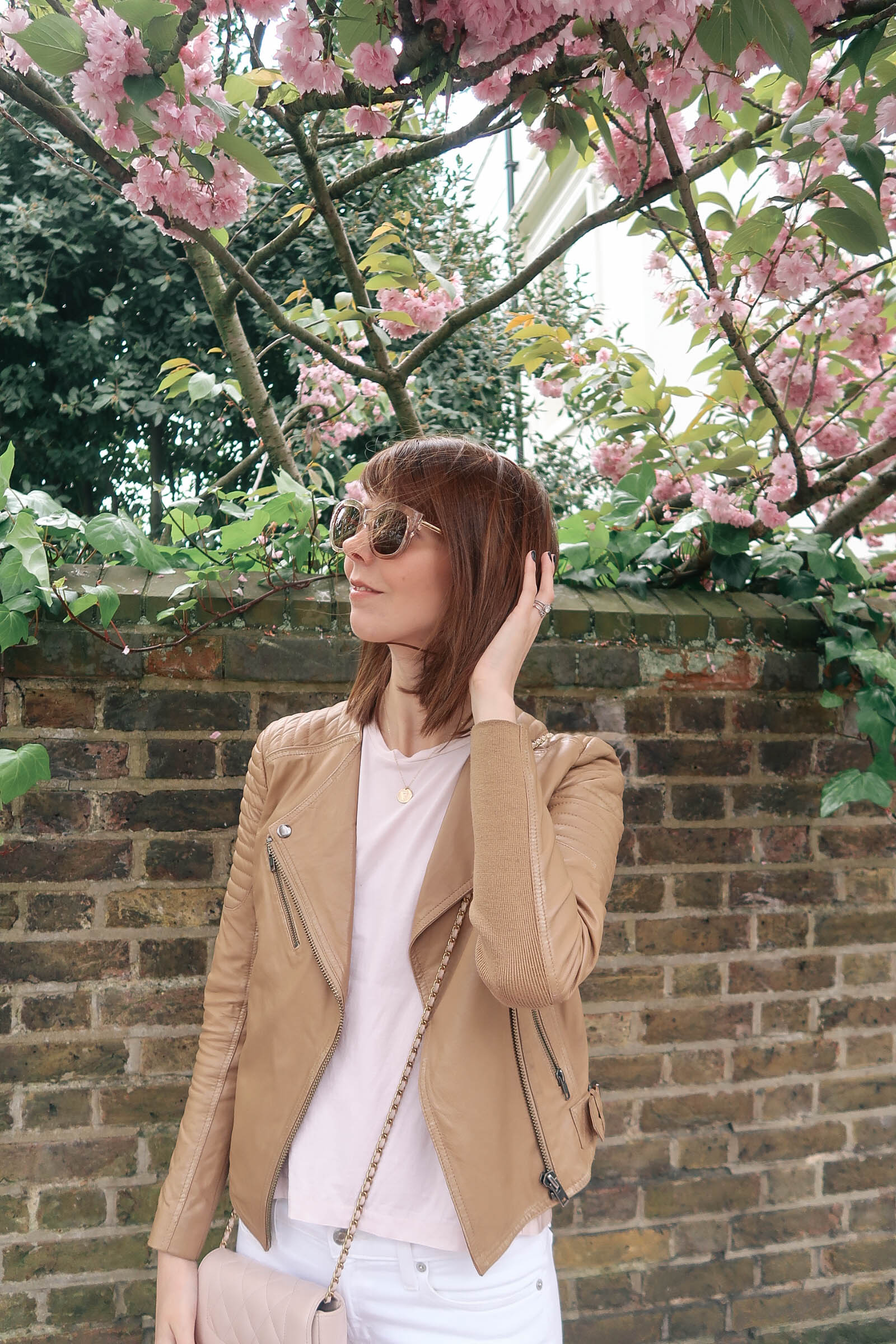 Cherry blossoms in Notting Hill, London wearing J.Crew jeans and a Chanel quilted bag | Pink, Purple and Petals | Sundays and Somedays