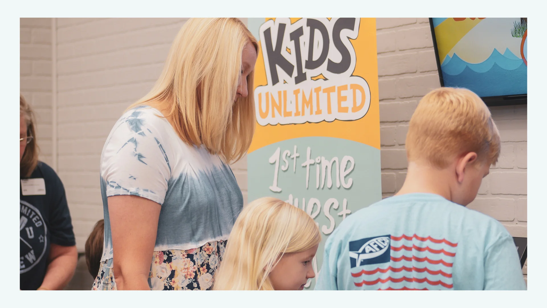 Kids Checkin w people.jpg
