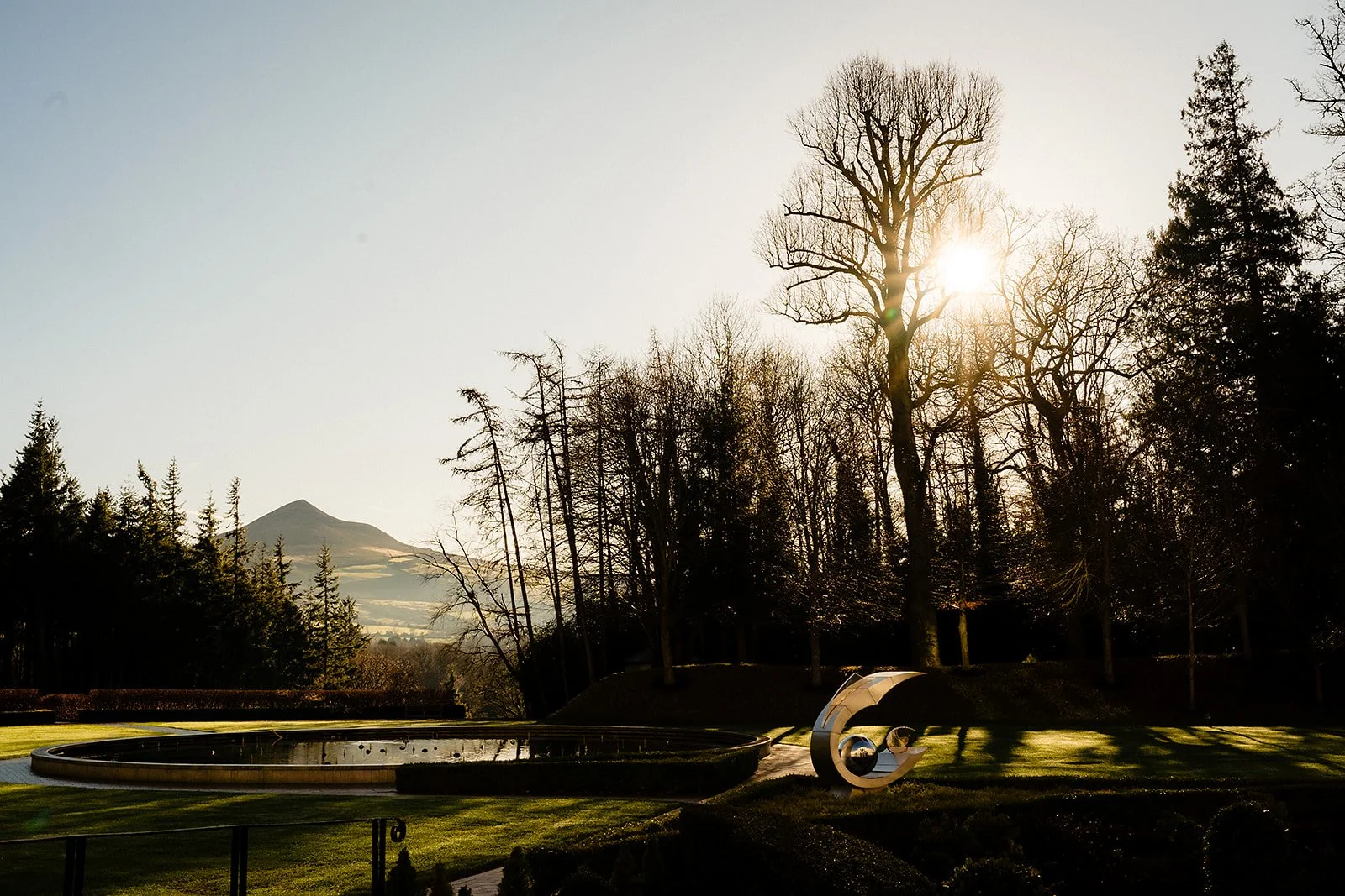 landscape image of sugar loaf in wicklow viewed from the back of powerscourt hotel during a wedding