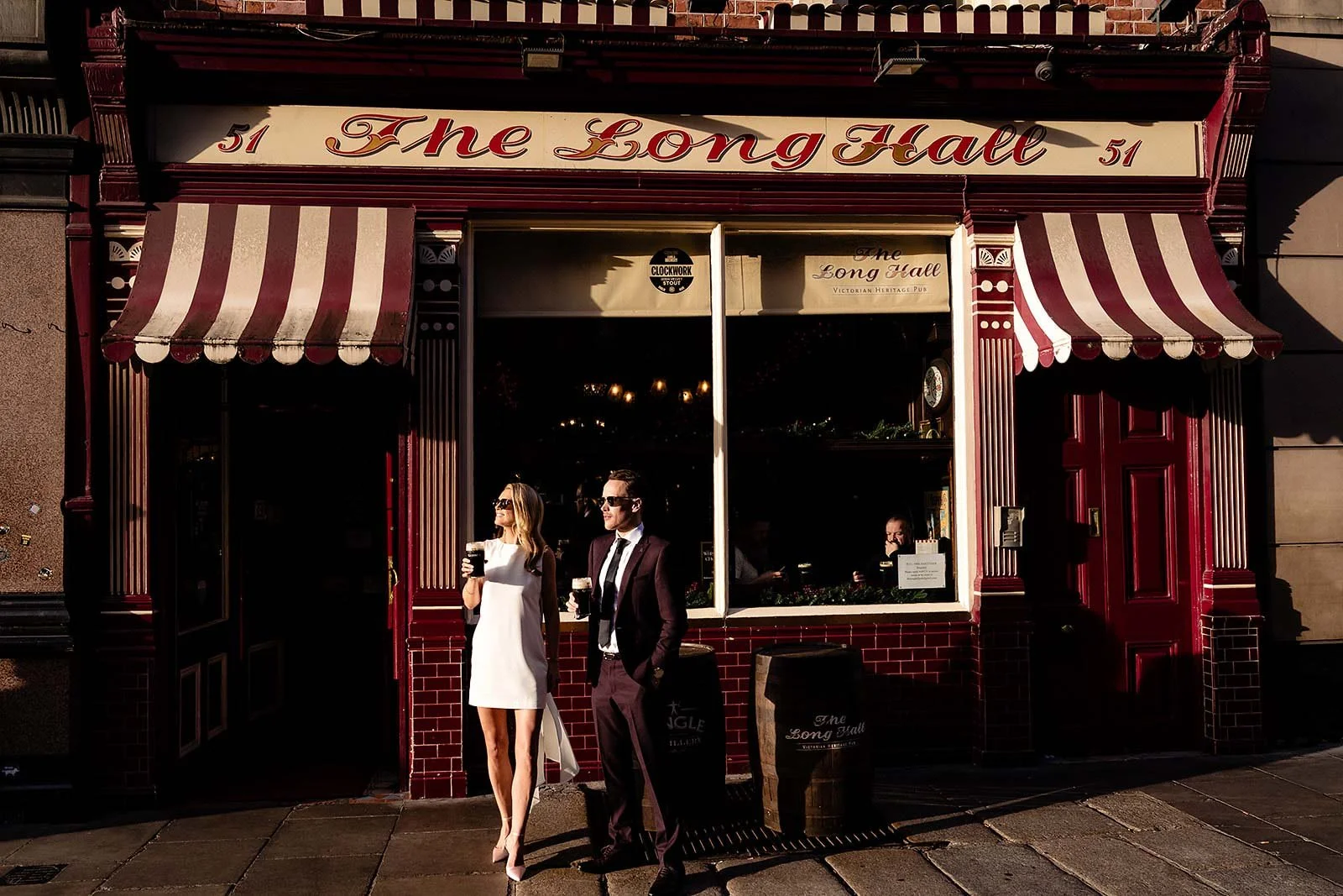 Long Hall Dublin city wedding photograph Evie & max in the sun