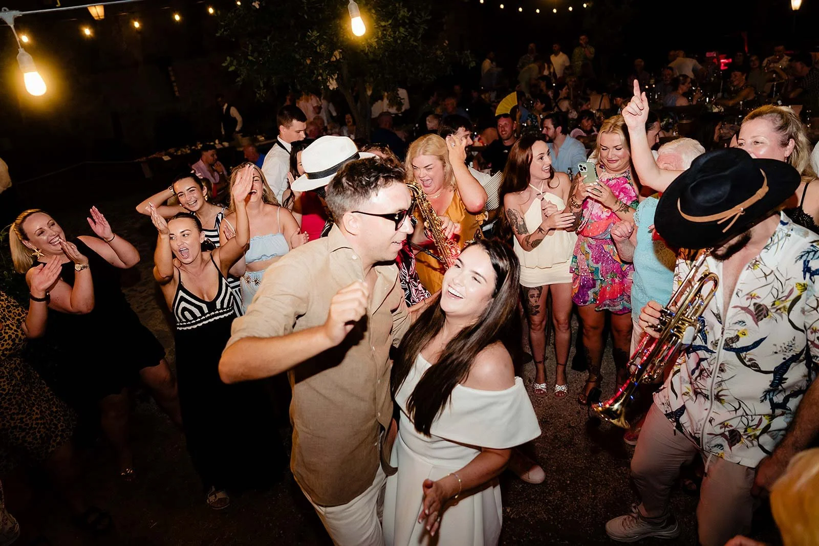 2. Guests dancing at welcome drinks in the hills outside Rome-13.jpg