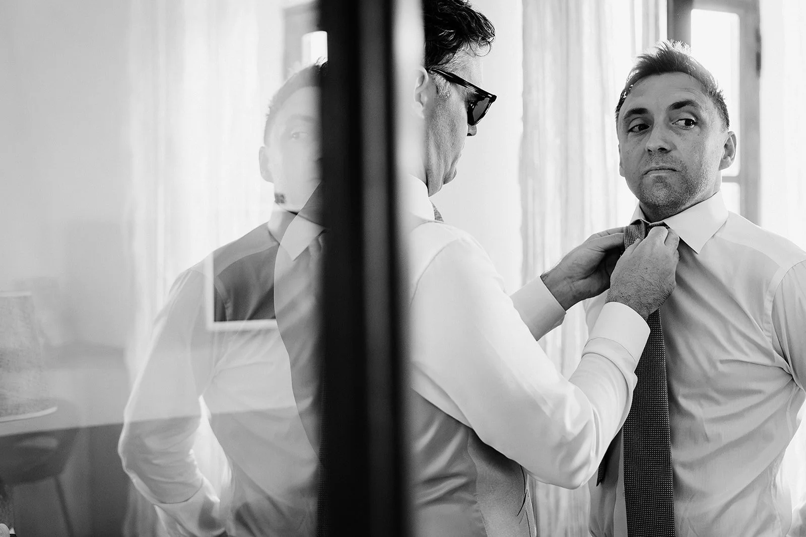 4. Dave laughing with his groomsmen before his Borgo di Tragliata wedding-18.jpg