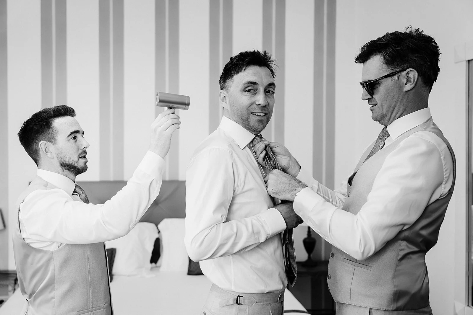 4. Dave laughing with his groomsmen before his Borgo di Tragliata wedding-19.jpg