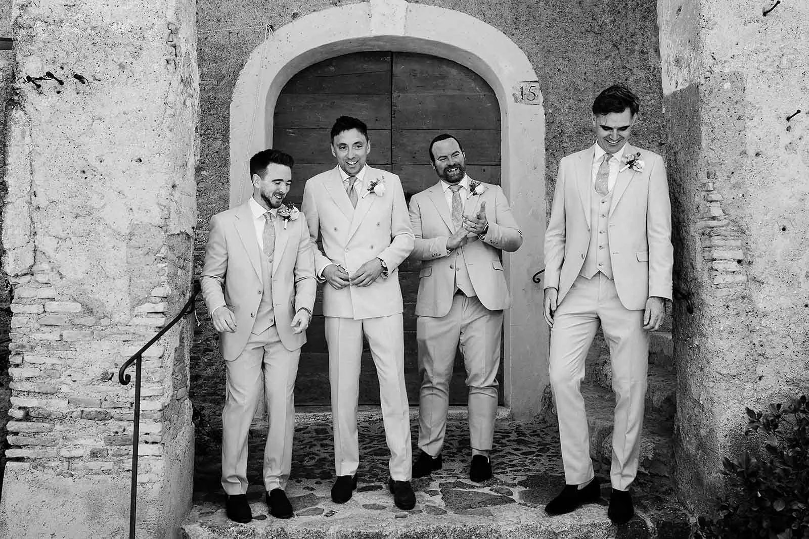 4. Dave laughing with his groomsmen before his Borgo di Tragliata wedding-29.jpg