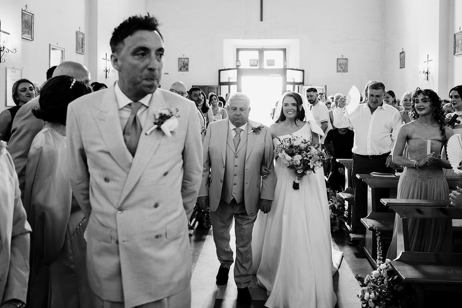 8. Fr Roberto Leoni marrying Niamh and Dave in the Borgo di Tragliata chapel-3.jpg