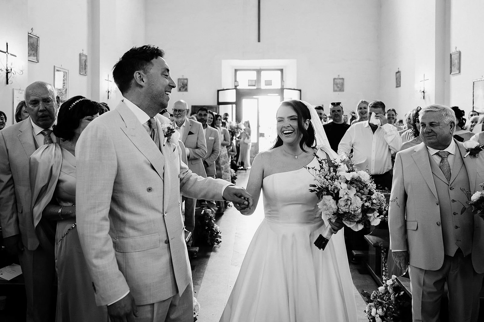 8. Fr Roberto Leoni marrying Niamh and Dave in the Borgo di Tragliata chapel-5.jpg