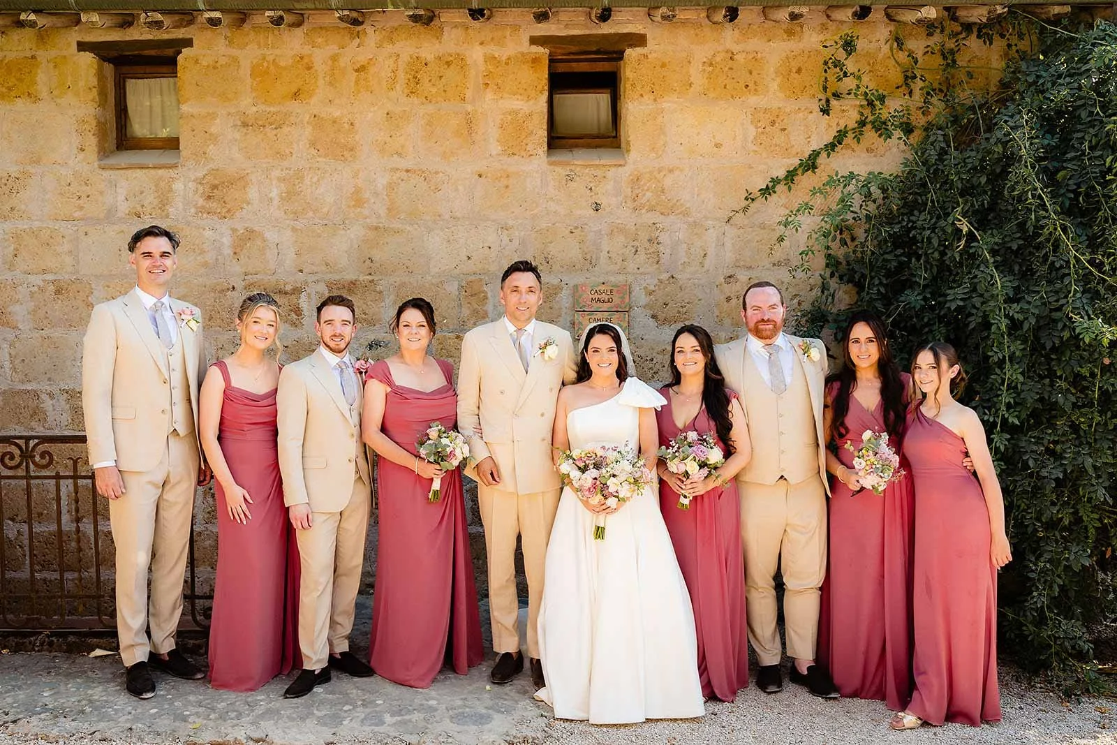 10. Niamh and Dave in the red Fiat with The Gloves brass band behind them at Borgo di Tragliata-8.jpg