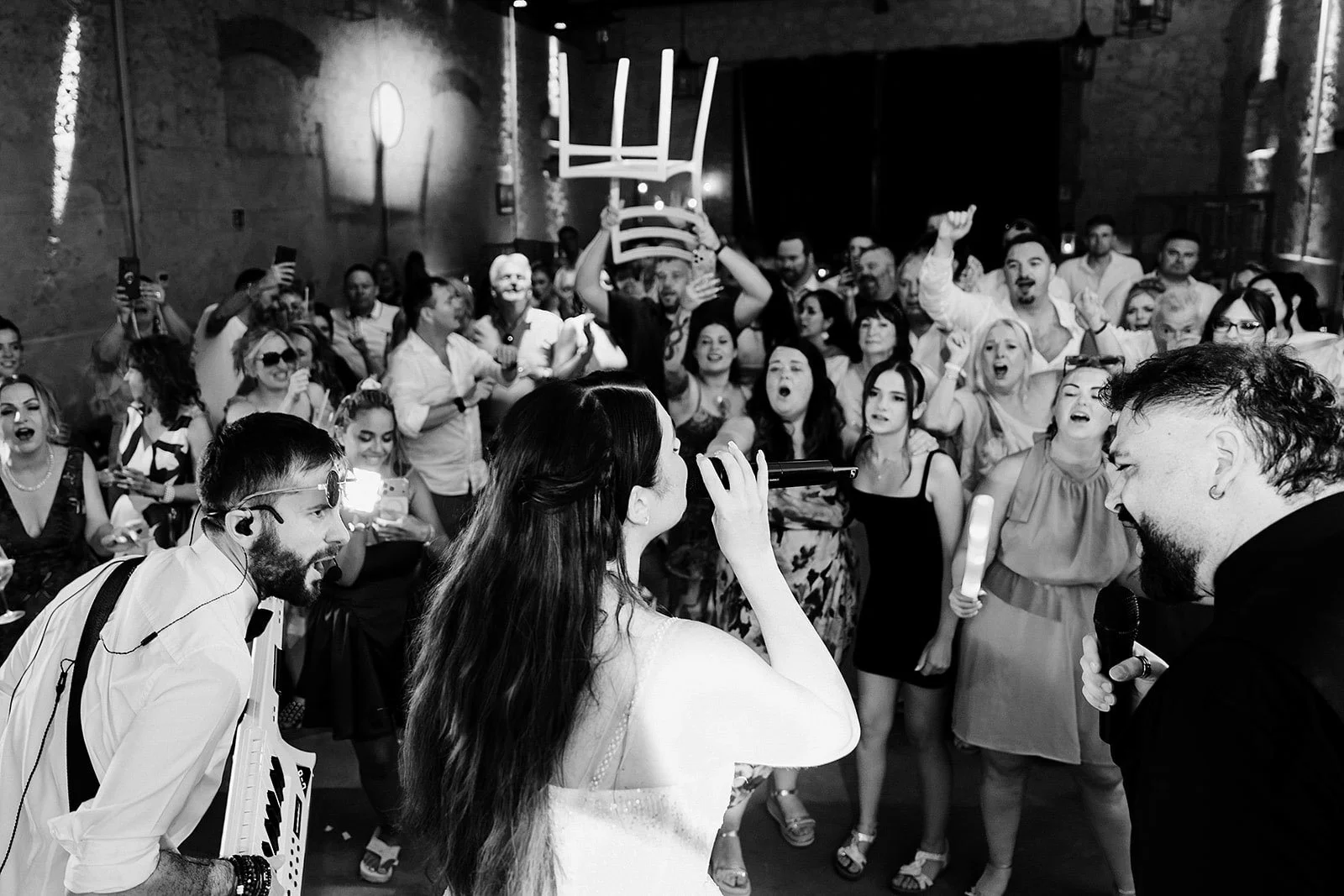 14. Niamh singing Zombie on stage with The Gloves at her Borgo di Tragliata wedding-11.jpg