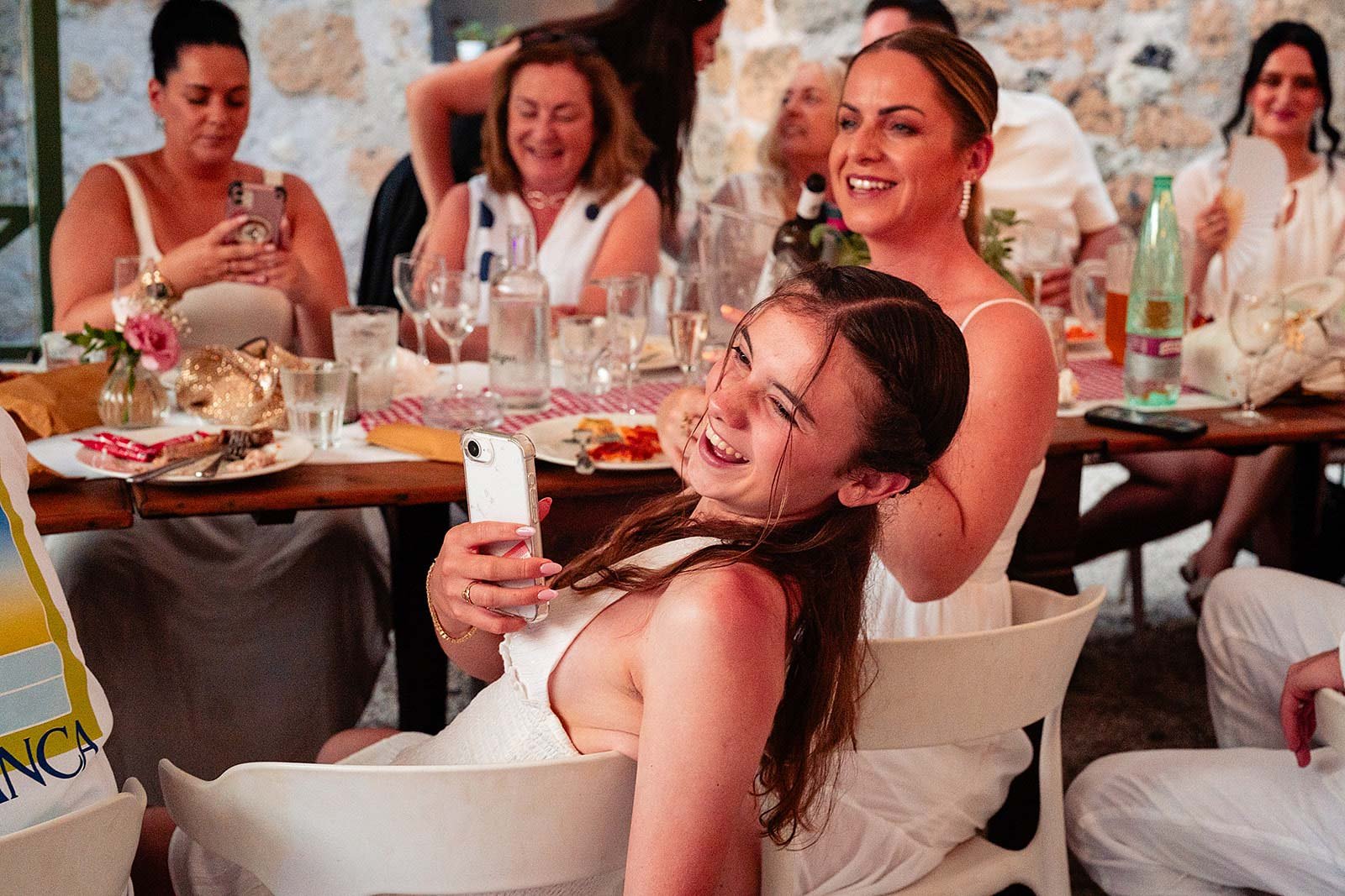 16. Guests dressed in white for dinner and karaoke at Borgo di Tragliata-18.jpg