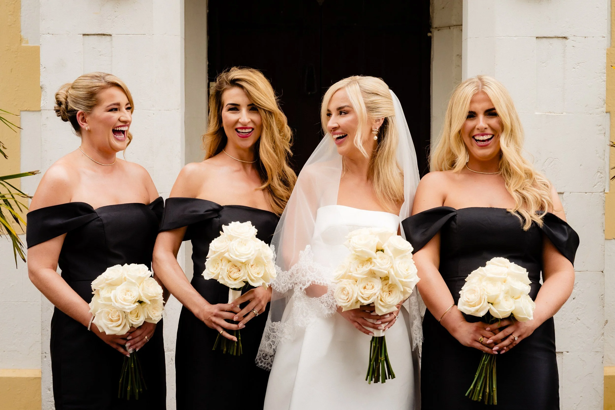 galgorm-wedding-photographer-holly-matt-20-bridesmaids-laughing.jpg