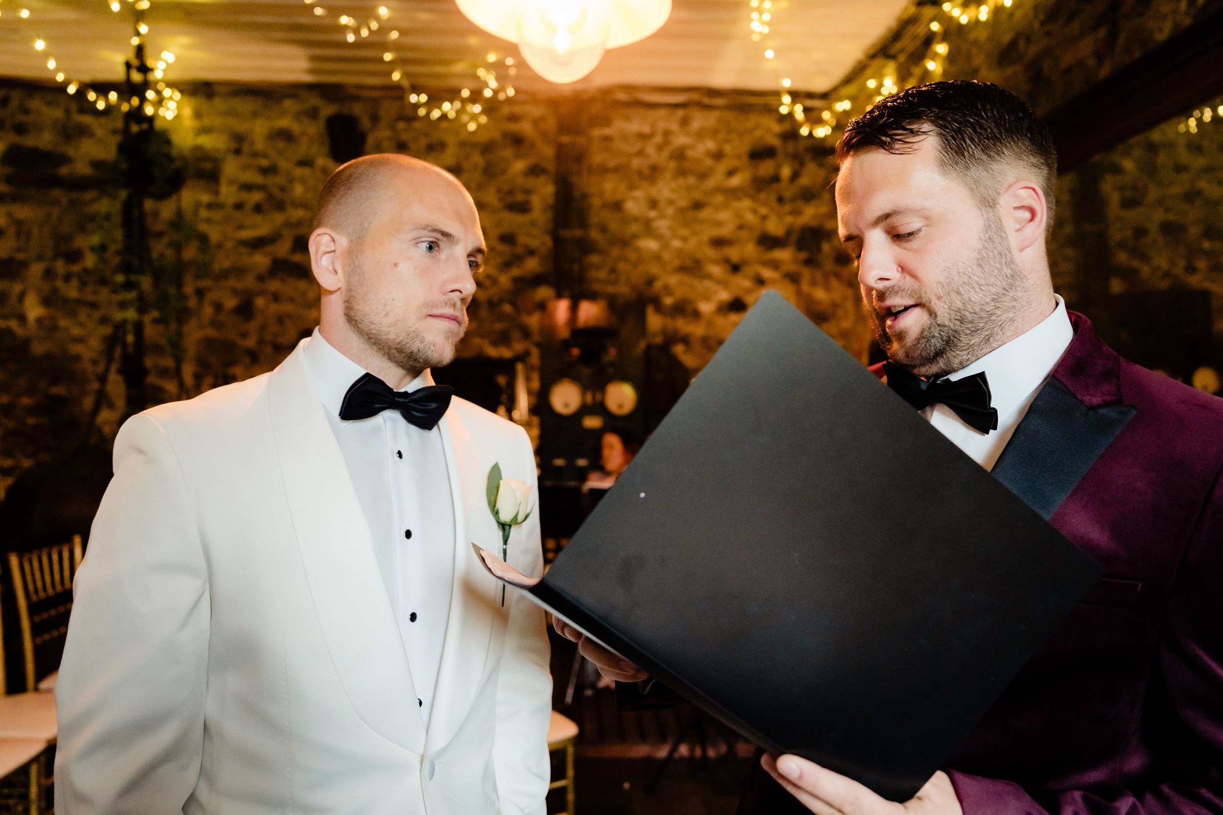 galgorm-wedding-photographer-holly-matt-28-matt-with-brother-chris-celebrant.jpg