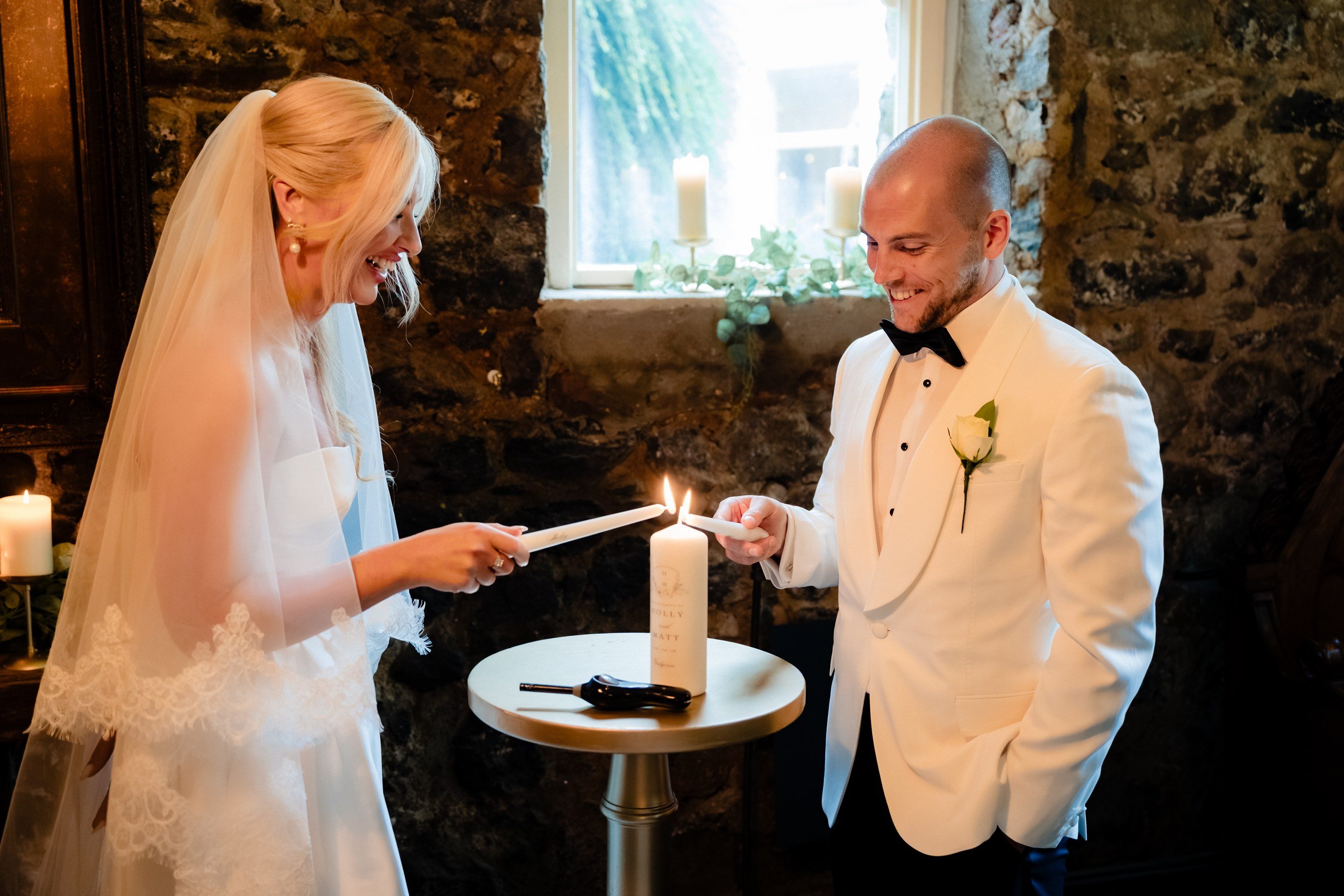 galgorm-wedding-photographer-holly-matt-37-lighting-the-candle.jpg