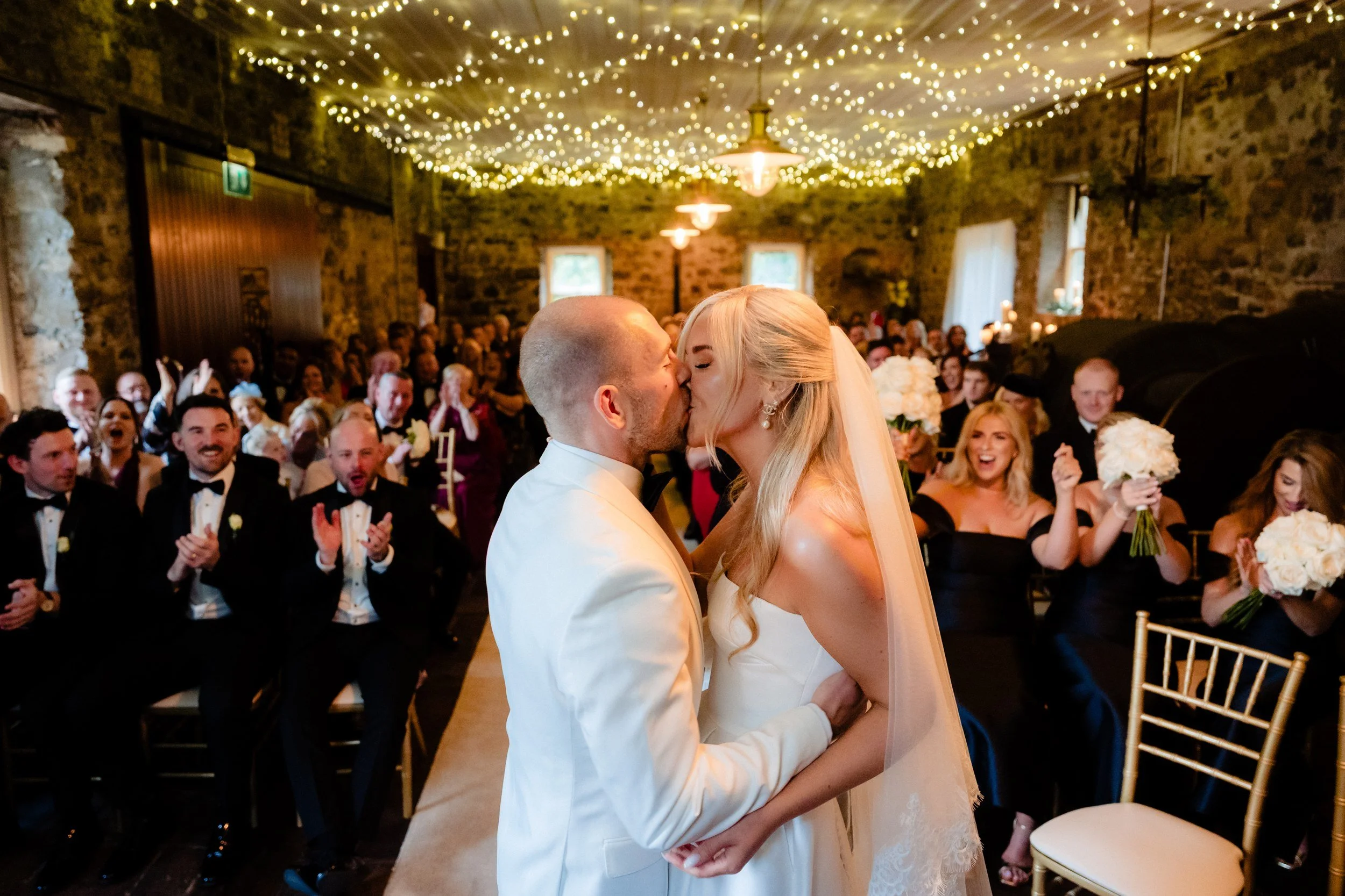 galgorm-wedding-photographer-holly-matt-40-first-kiss.jpg