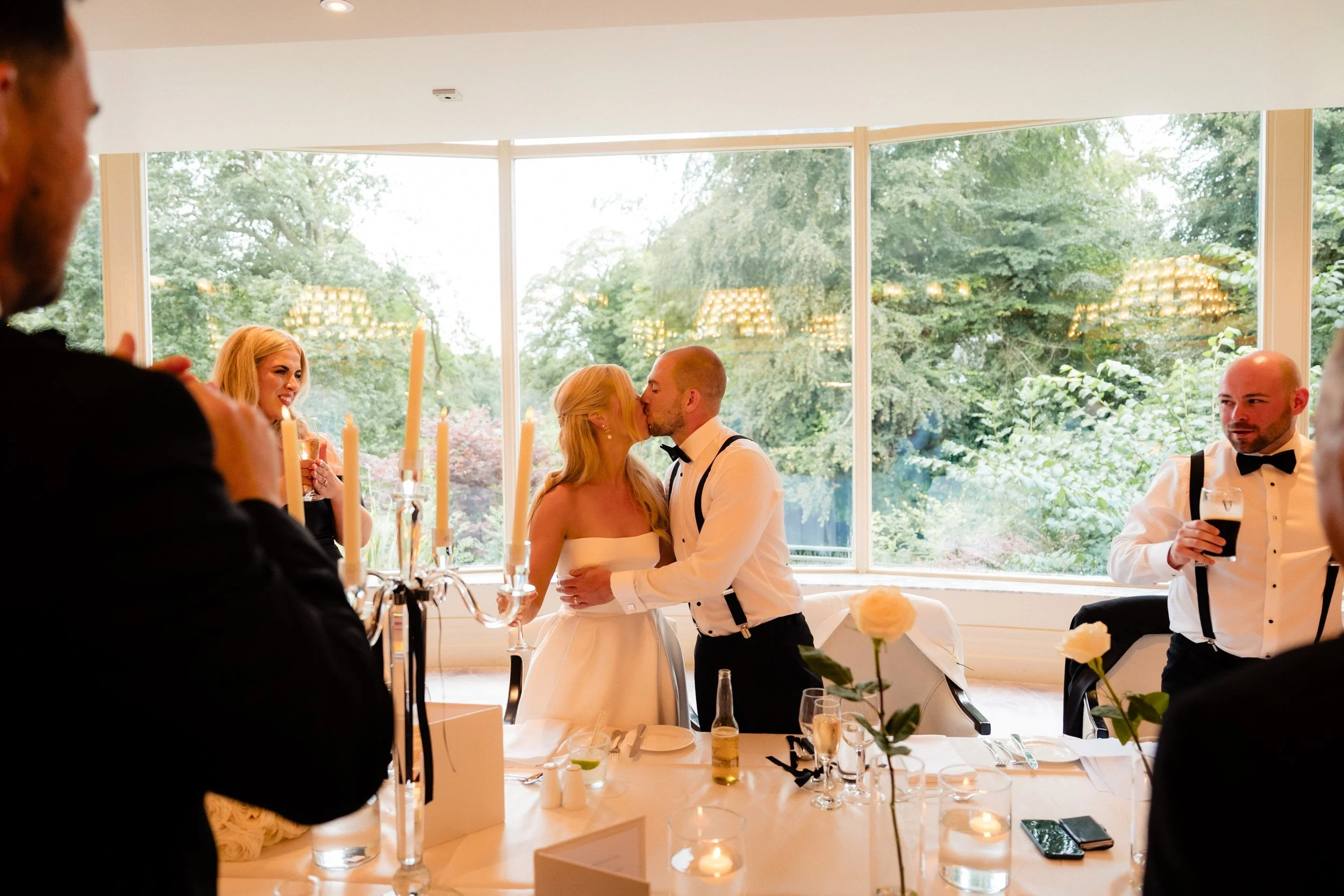 galgorm-wedding-photographer-holly-matt-60-kiss-after-the-speeches.jpg