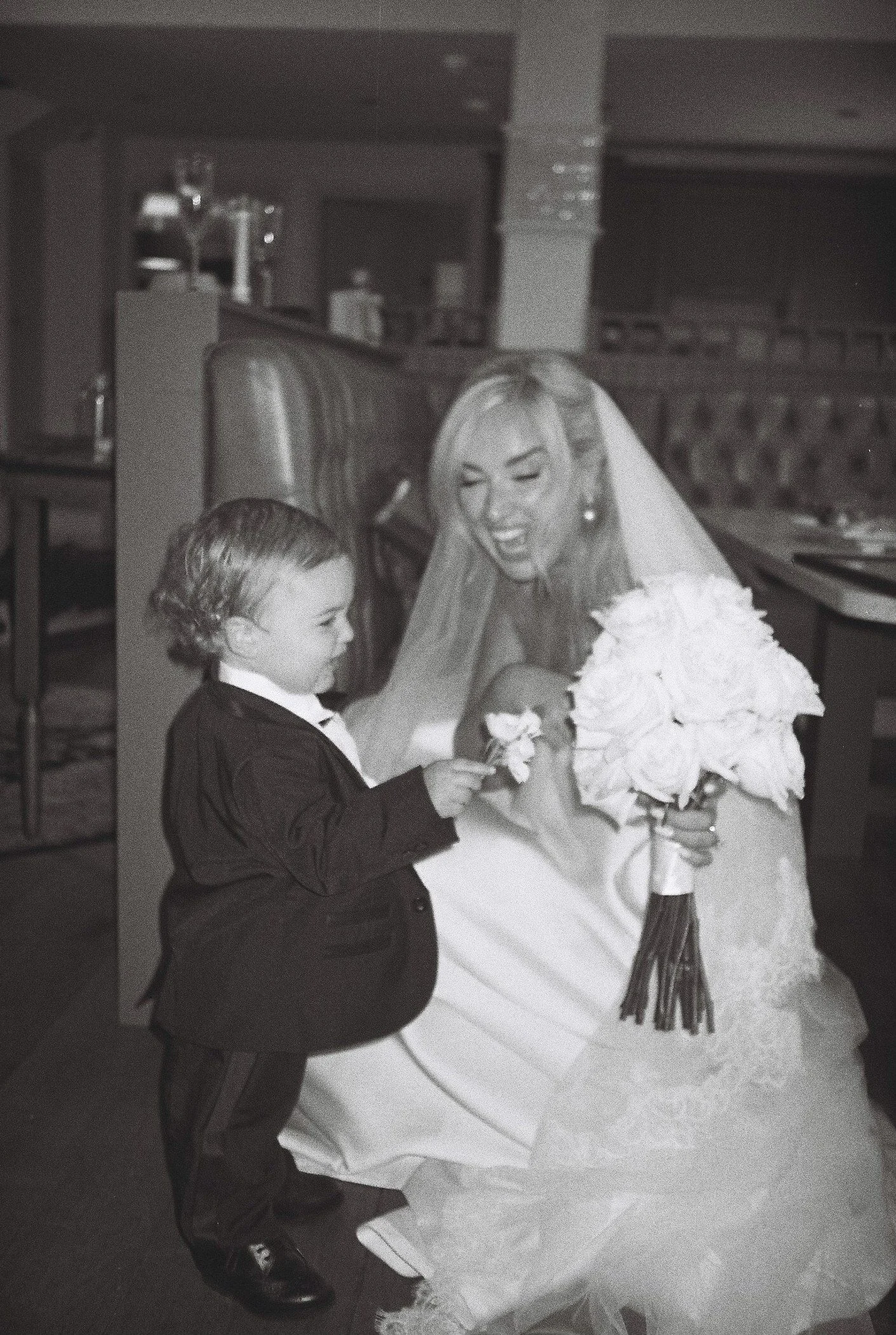 galgorm-wedding-photographer-holly-matt-77-film-holly-and-page-boy.jpg