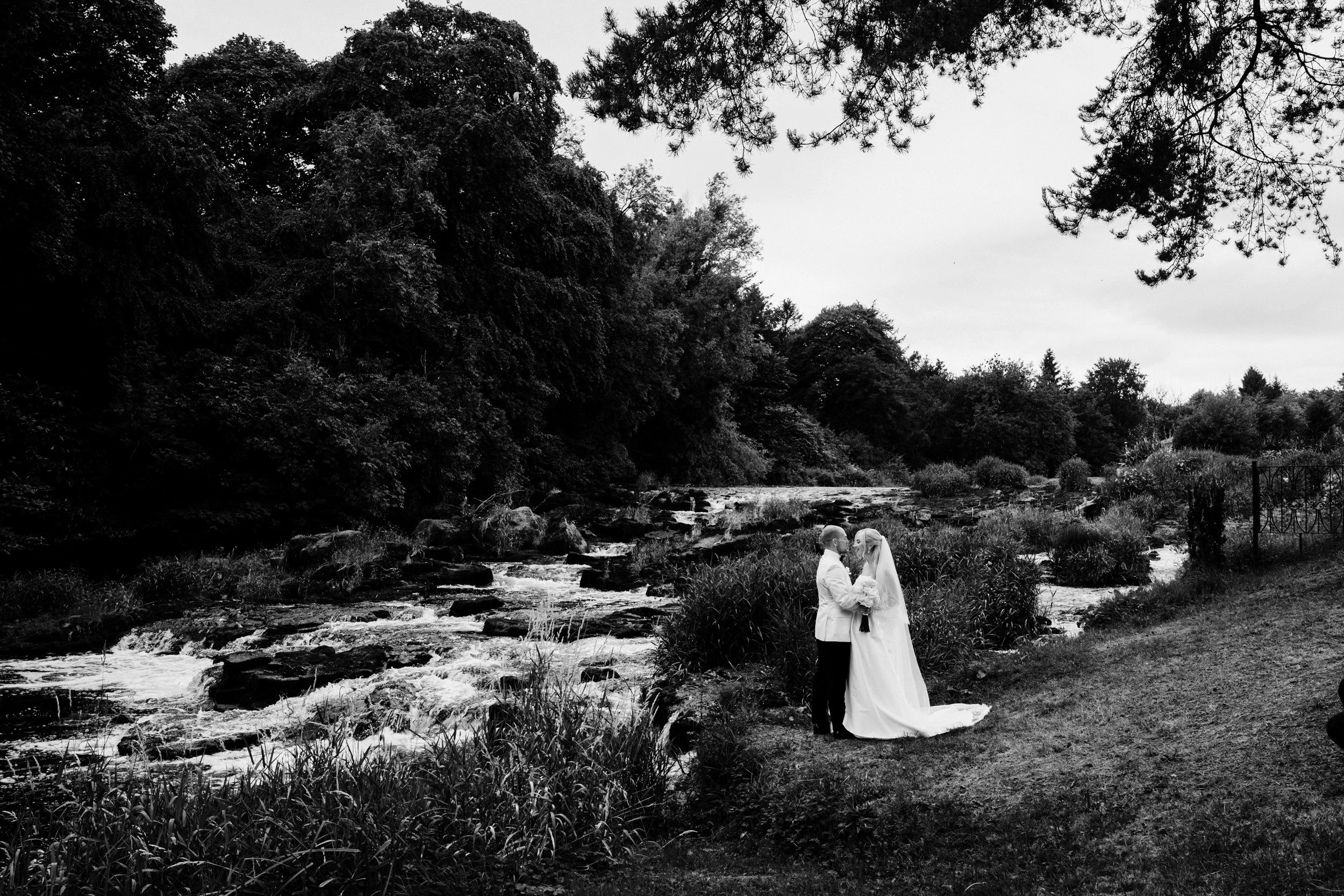 galgorm-wedding-photographer-holly-matt-47-walk-by-the-river.jpg