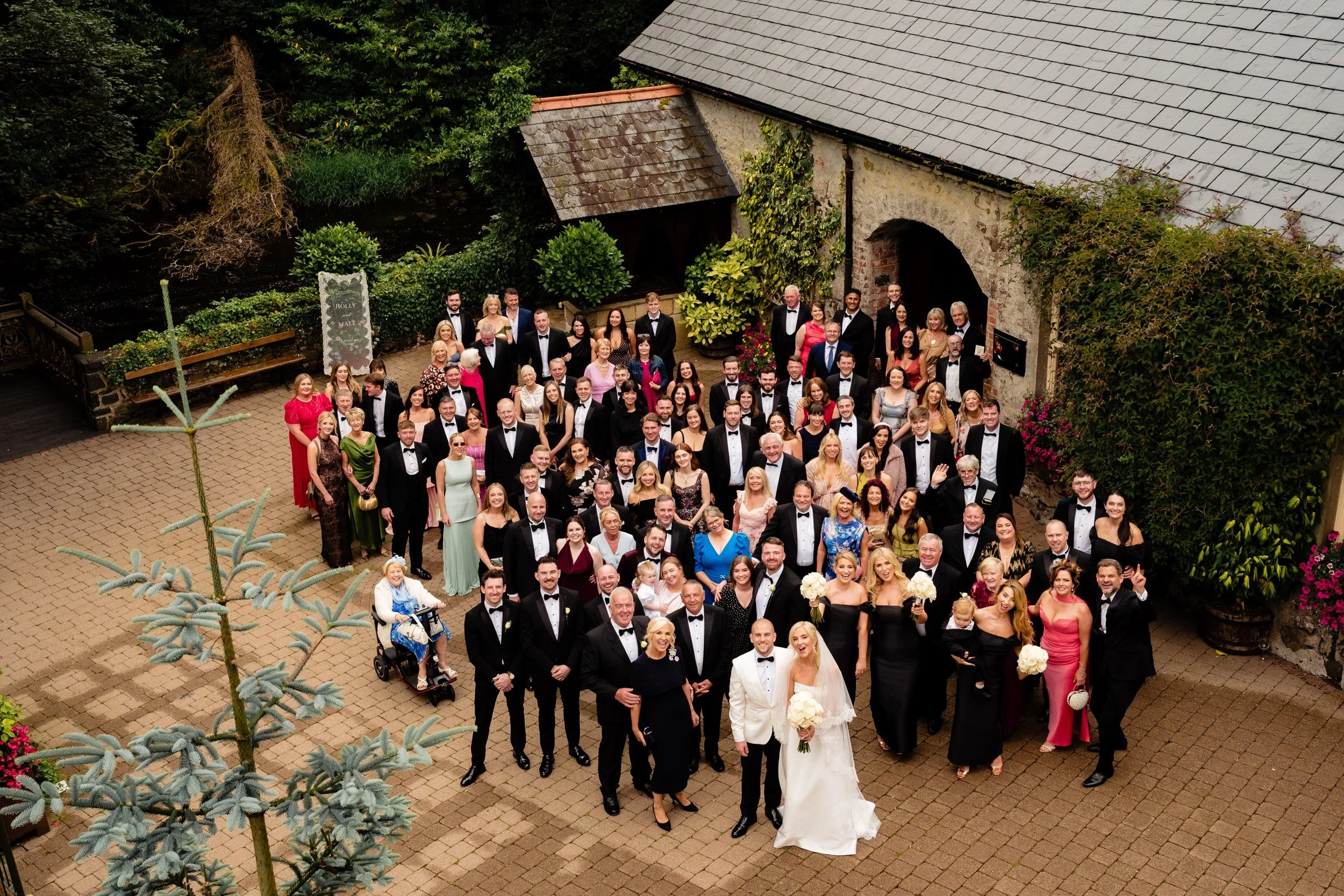 galgorm-wedding-photographer-holly-matt-46-group-photo-from-above.jpg