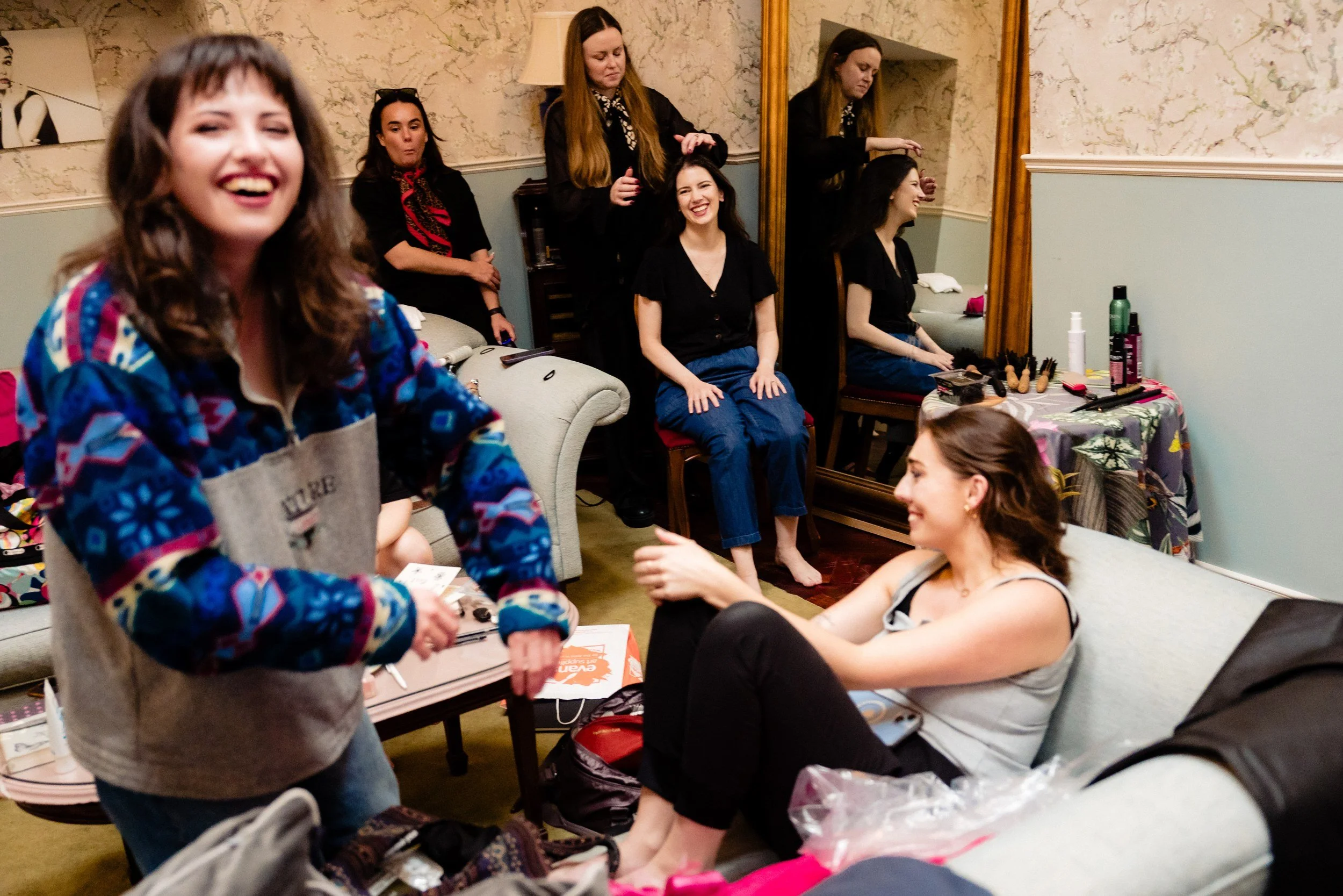 tinakilly-wedding-photographer-laura-james-04-laura-laughing-with-her-bridesmaids.jpg