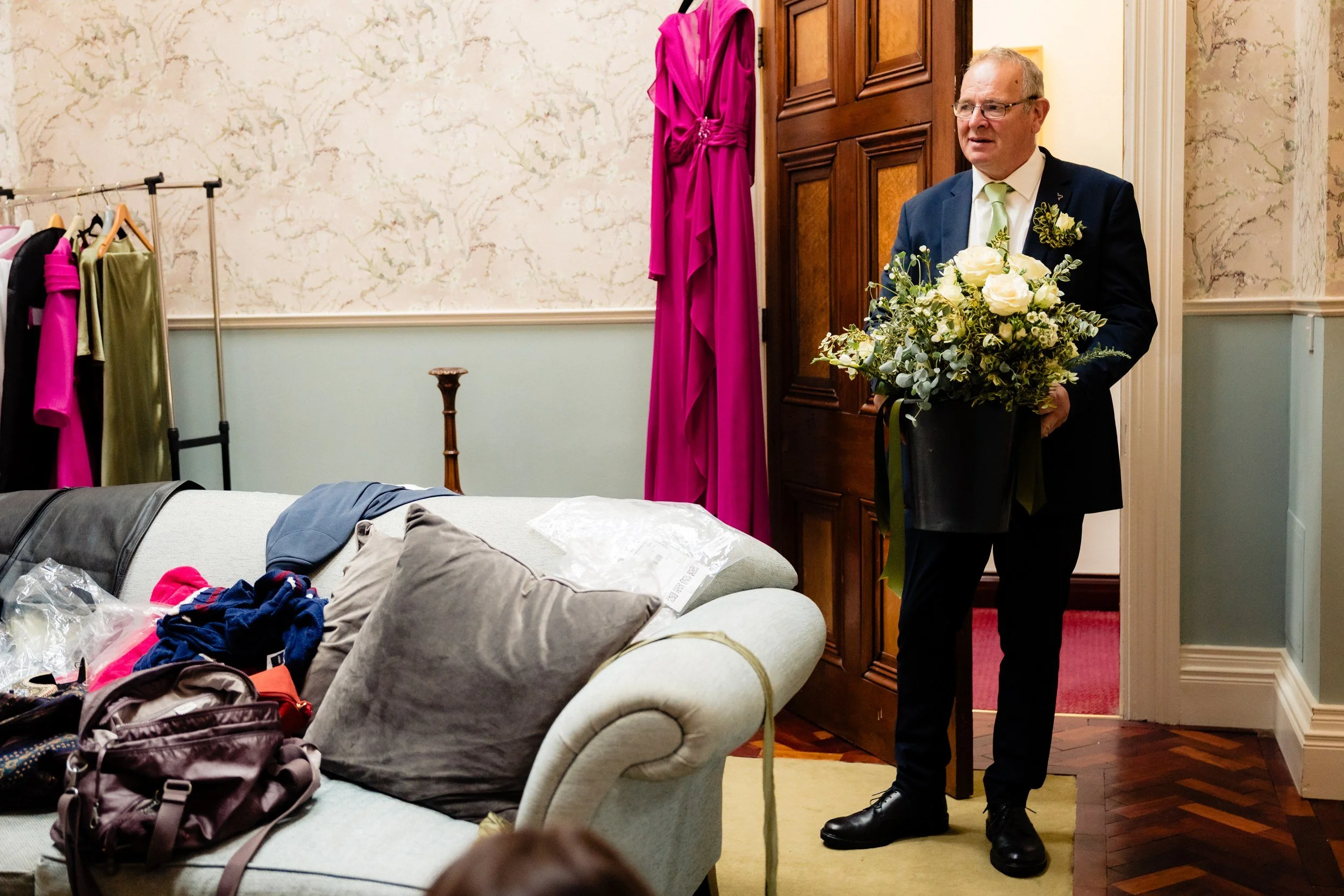 tinakilly-wedding-photographer-laura-james-05-dad-arrives-with-the-flowers.jpg