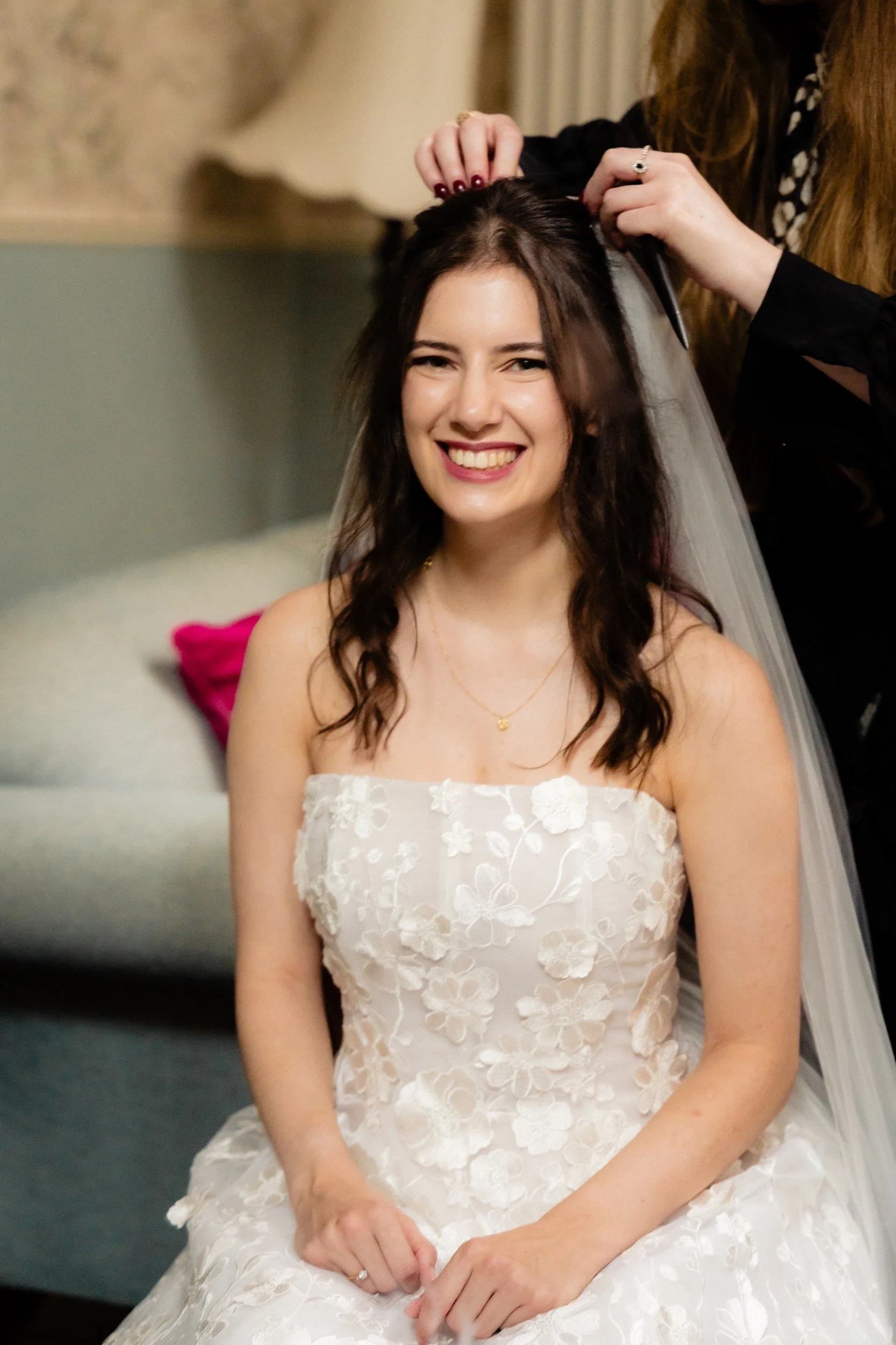 tinakilly-wedding-photographer-laura-james-07-veil-going-in.jpg