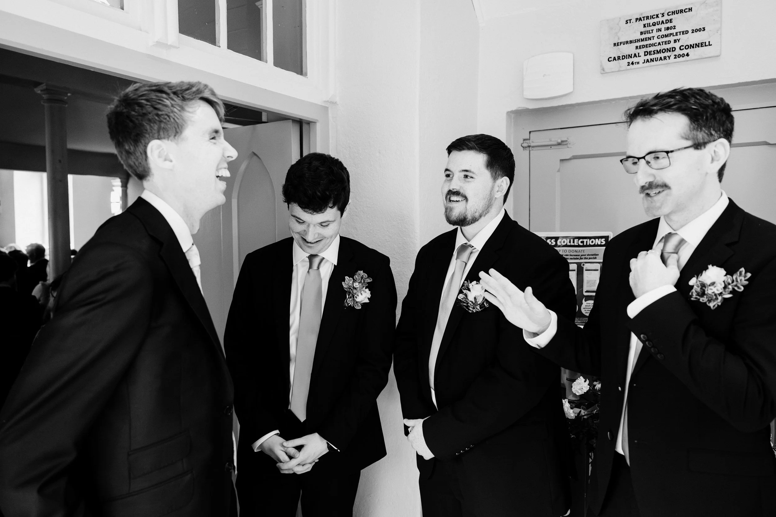 tinakilly-wedding-photographer-laura-james-14-groomsmen-laughing.jpg
