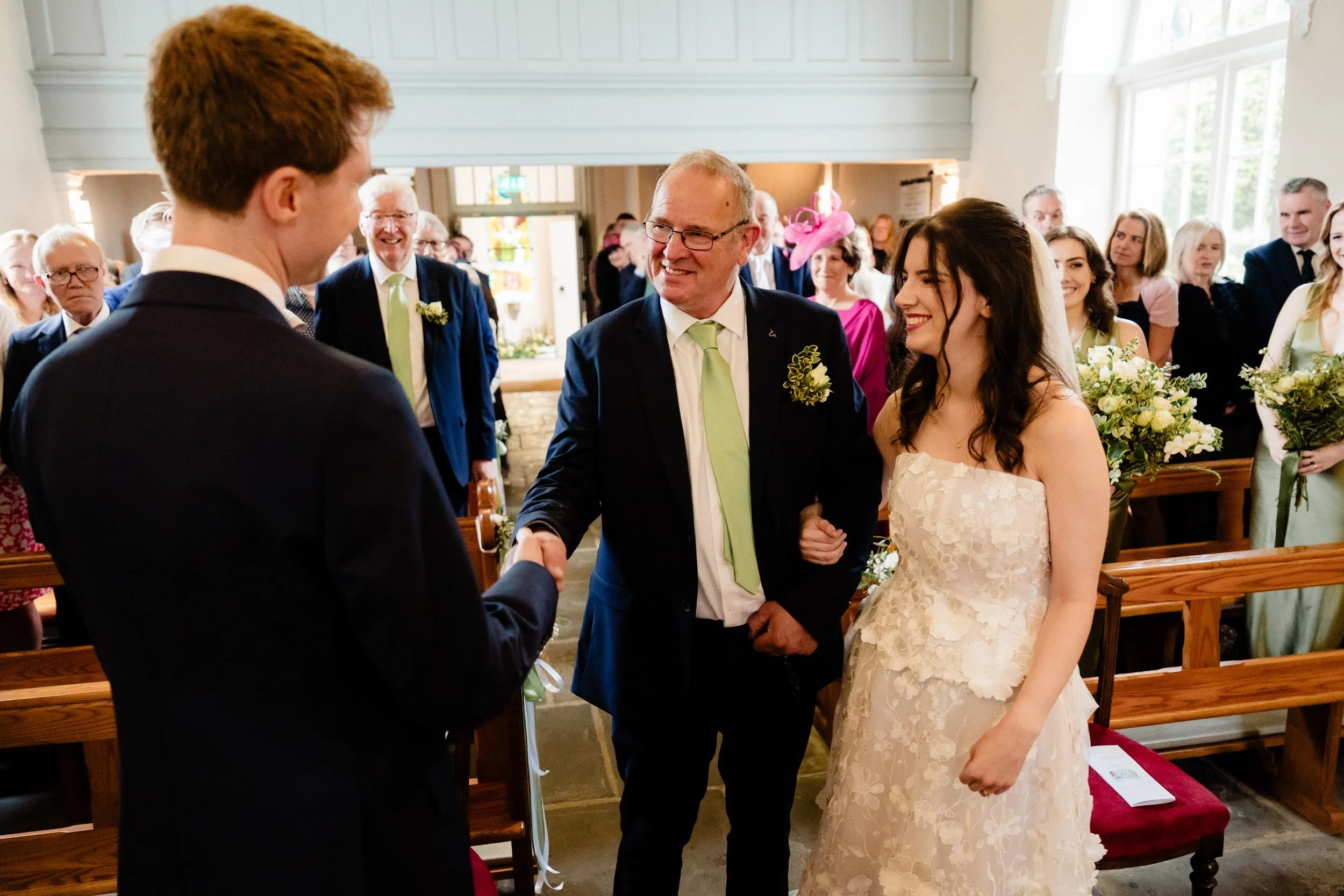 tinakilly-wedding-photographer-laura-james-25-dad-hands-laura-over.jpg