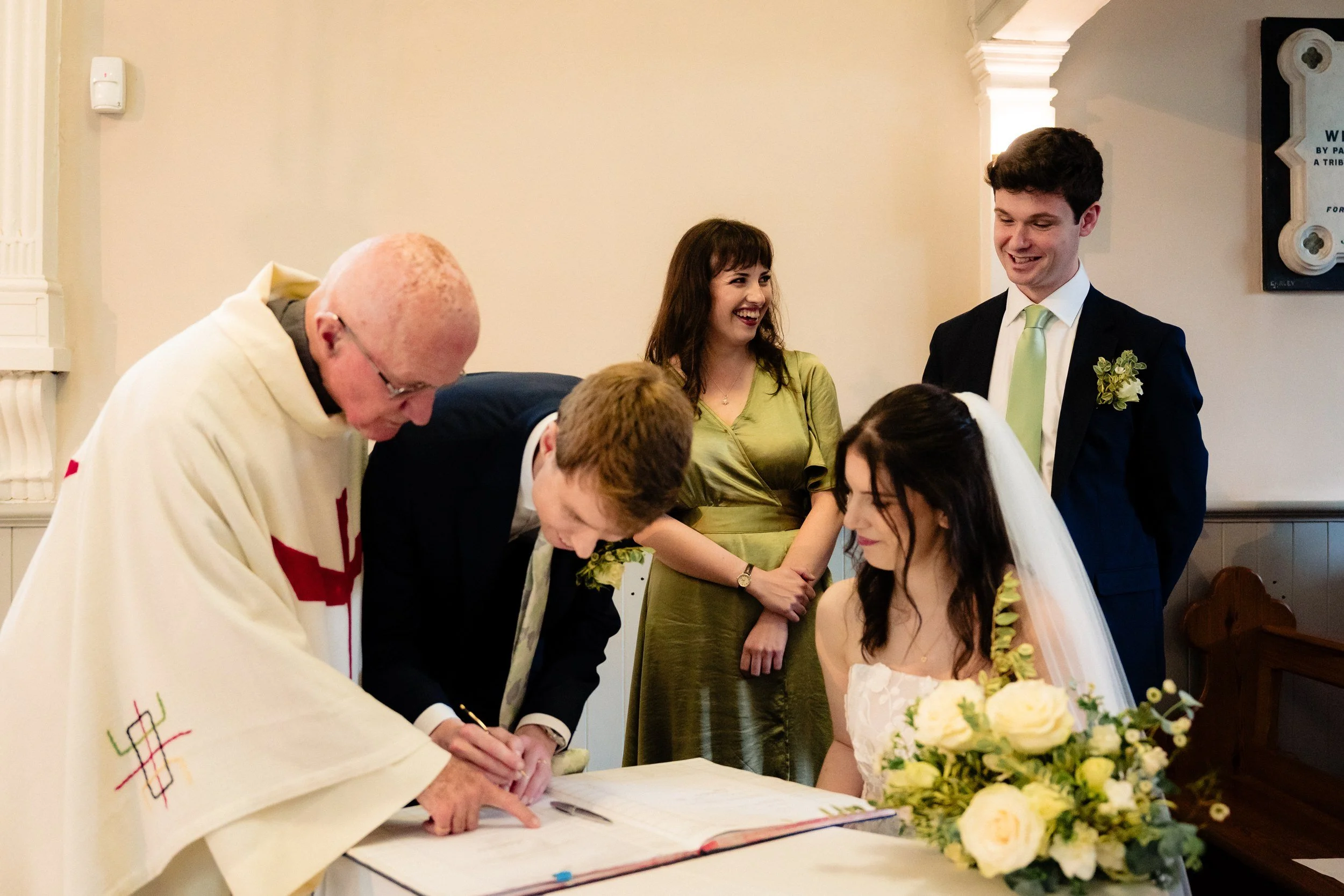 tinakilly-wedding-photographer-laura-james-32-signing-the-register.jpg