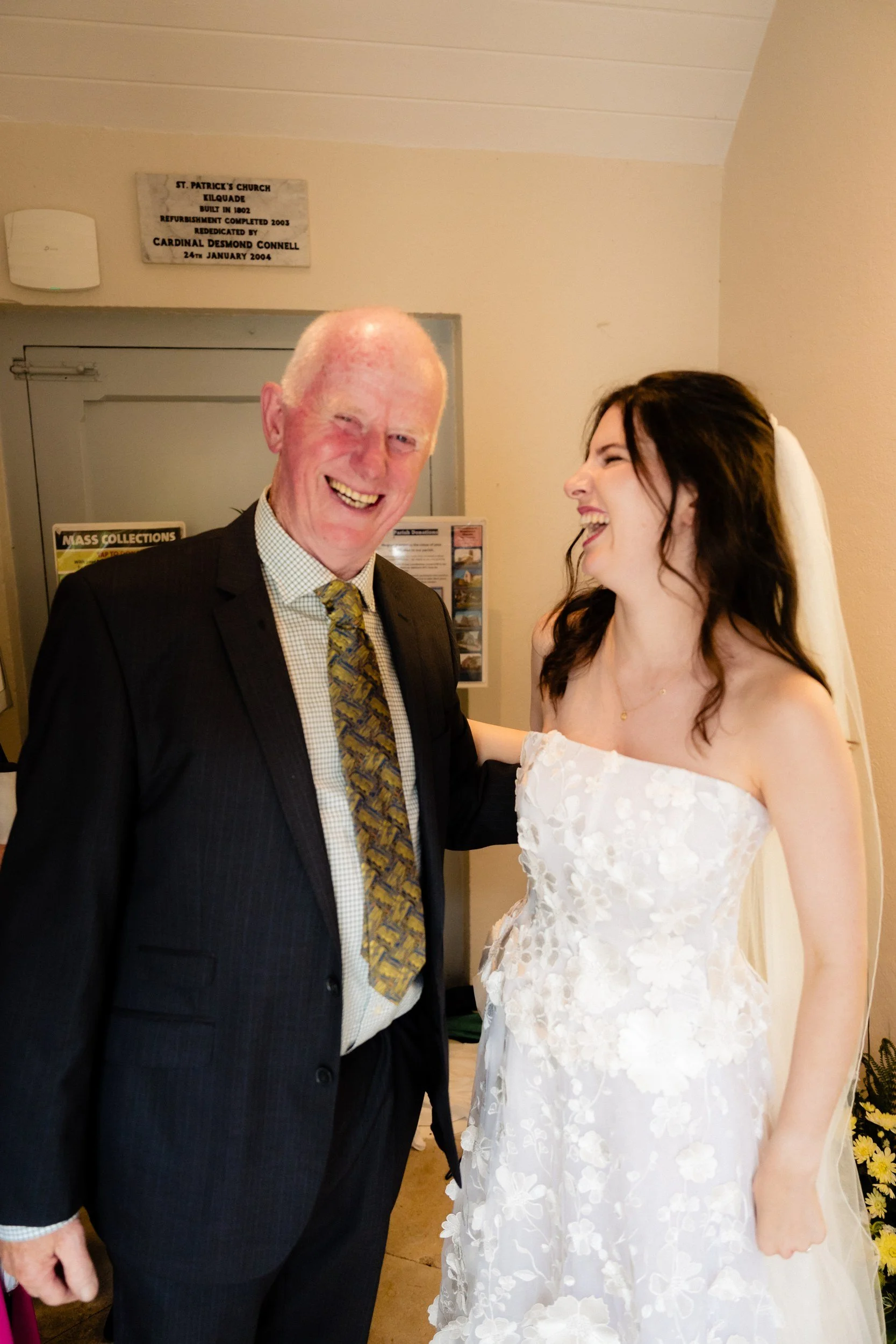 tinakilly-wedding-photographer-laura-james-34-laura-laughing-with-her-dad-after-the-ceremony.jpg