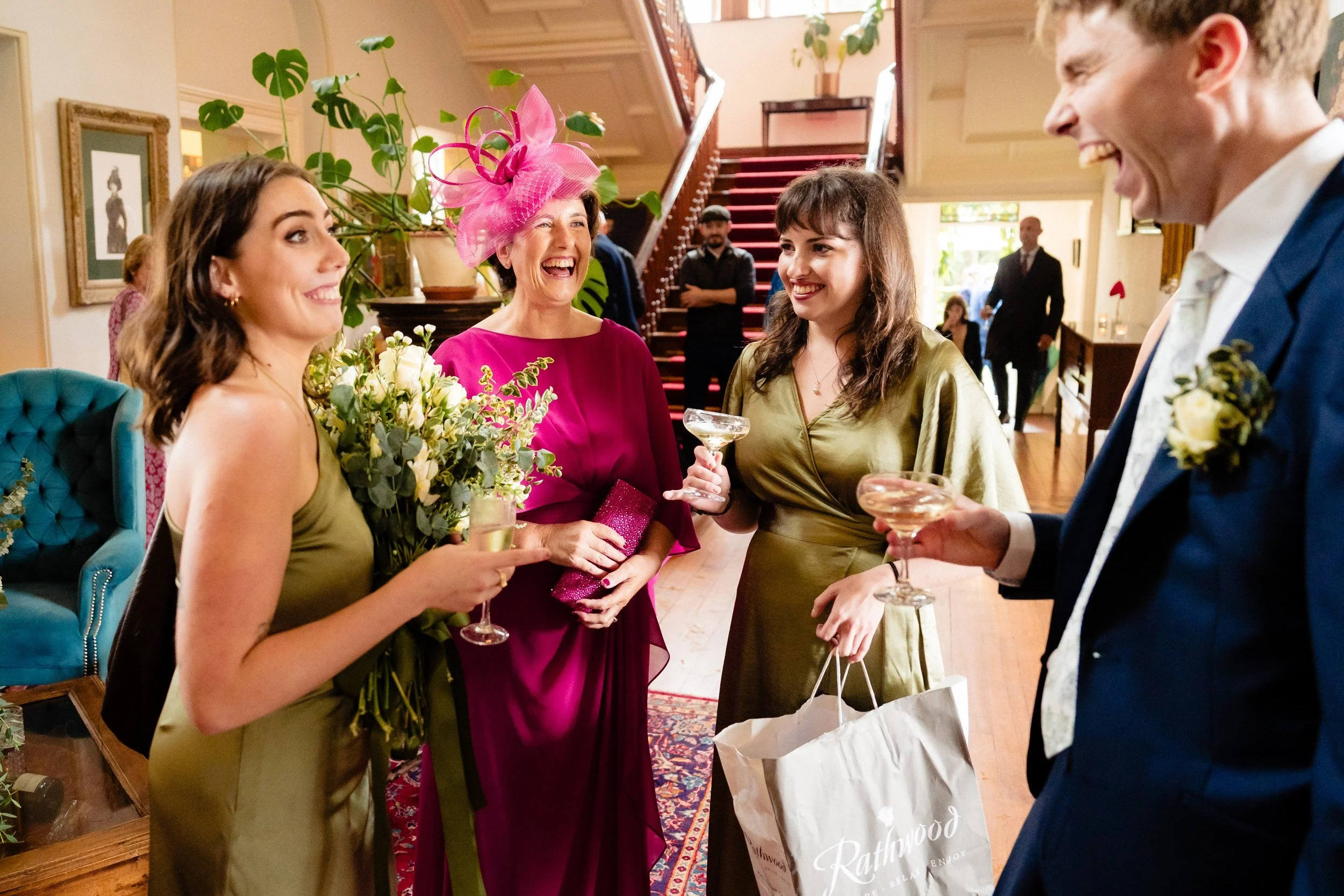 tinakilly-wedding-photographer-laura-james-41-laughing-with-the-bridesmaids.jpg